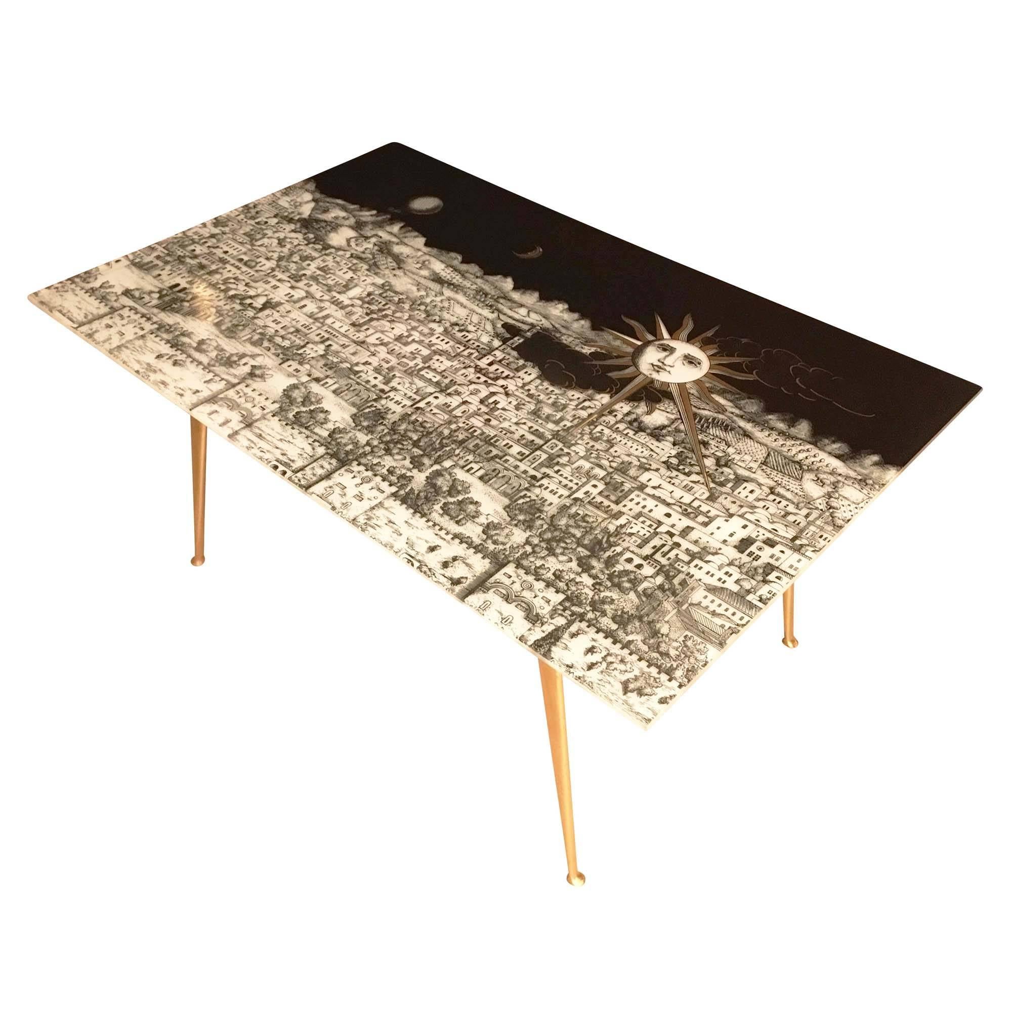 Beautiful Fornasetti coffee table from the 1990s with a screen printed glass top featuring the “Gerusalemme” motif. Marked on the bottom left corner. The glass top was originally conceived as a decorative wall panel and has been placed on a
