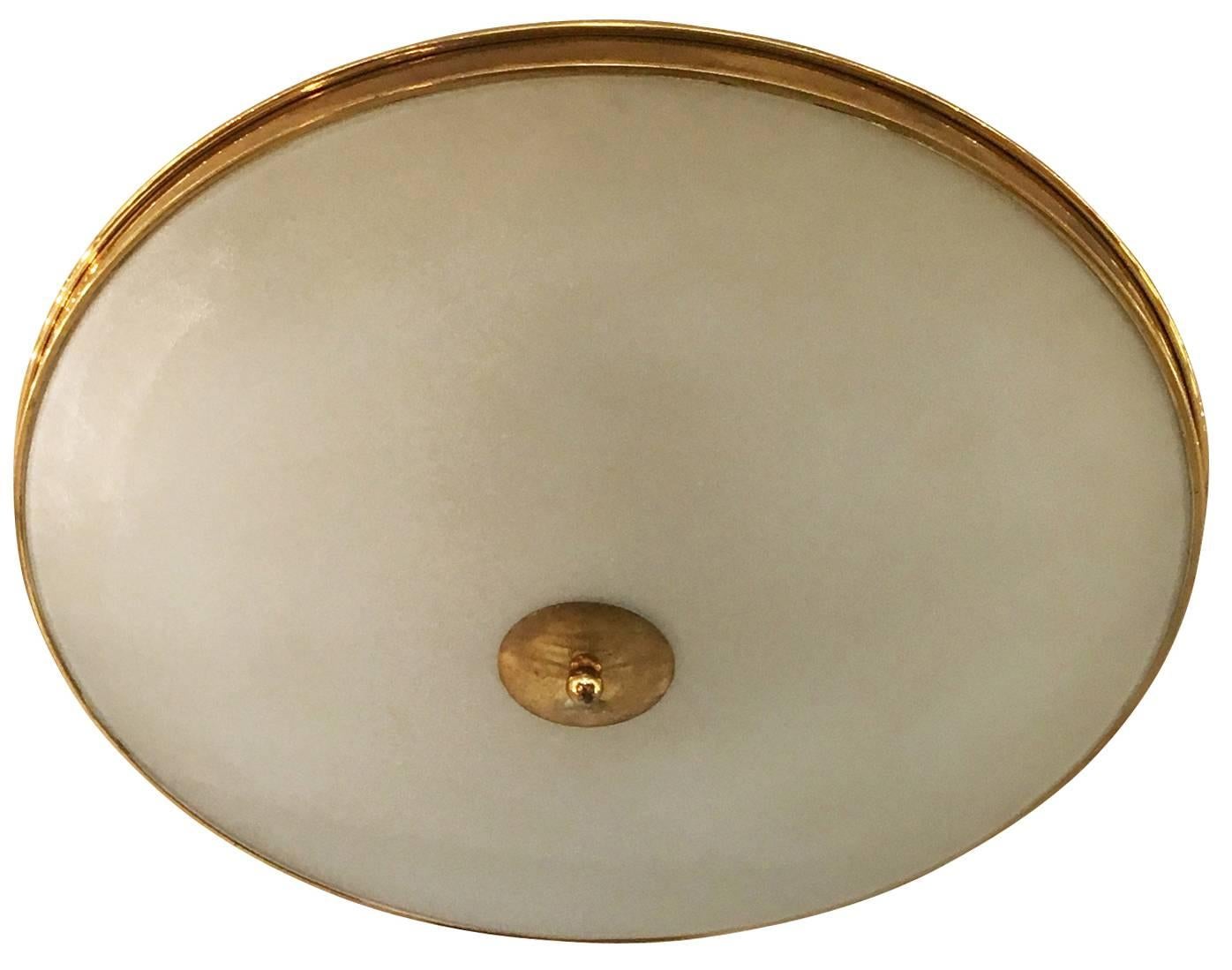 Circular glass and brass flush mount fixture attributed to Pietro Chiesa for Fontana Arte. Simple and elegant.
