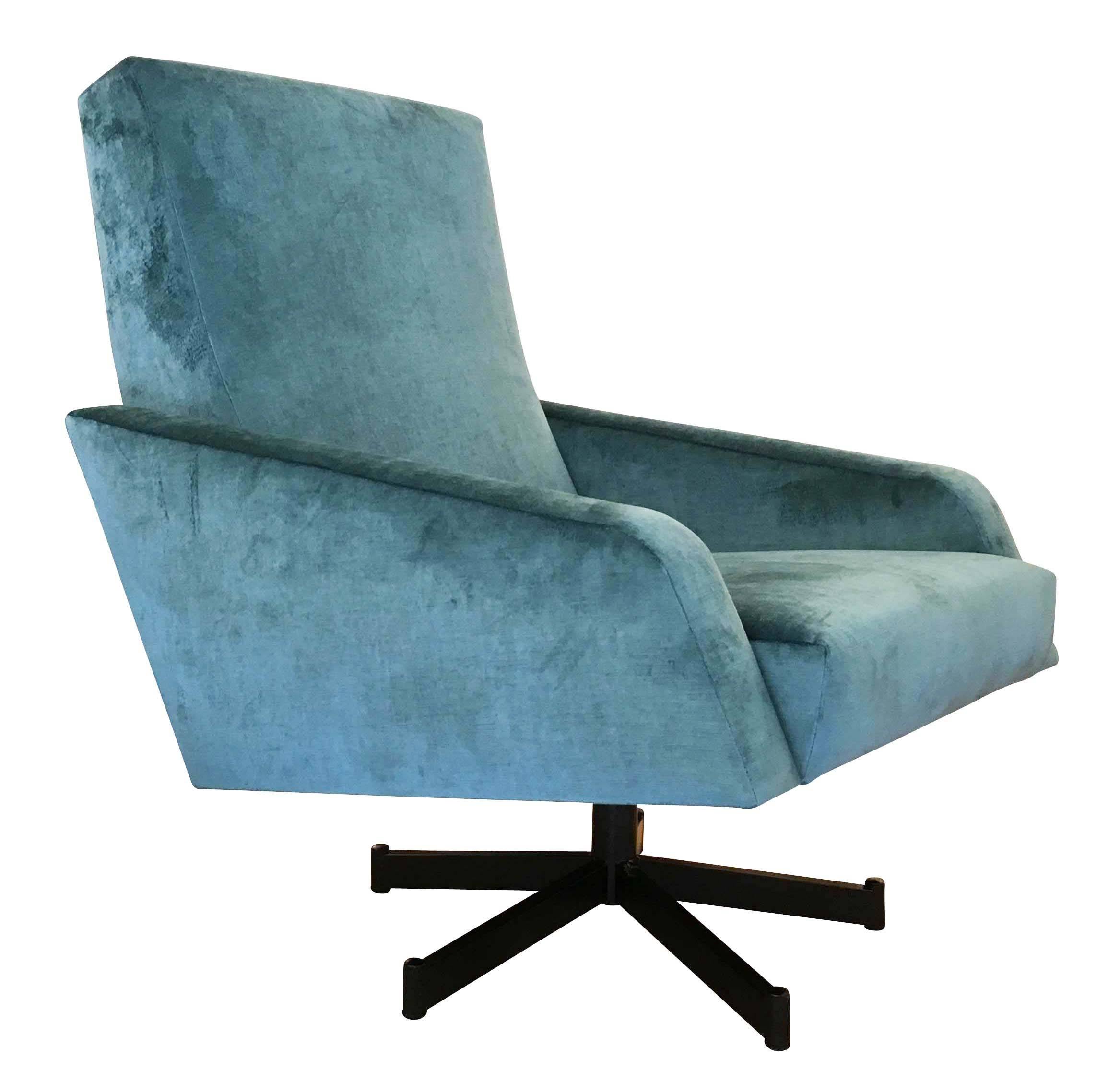 Elegant pair of swivel lounge chairs characterized by straight and diagonal lines. Very comfortable, the seat is on a black swivel base that turns 360 degrees. A great example of Mid-Century Italian design. One armchairs has been newly upholstered