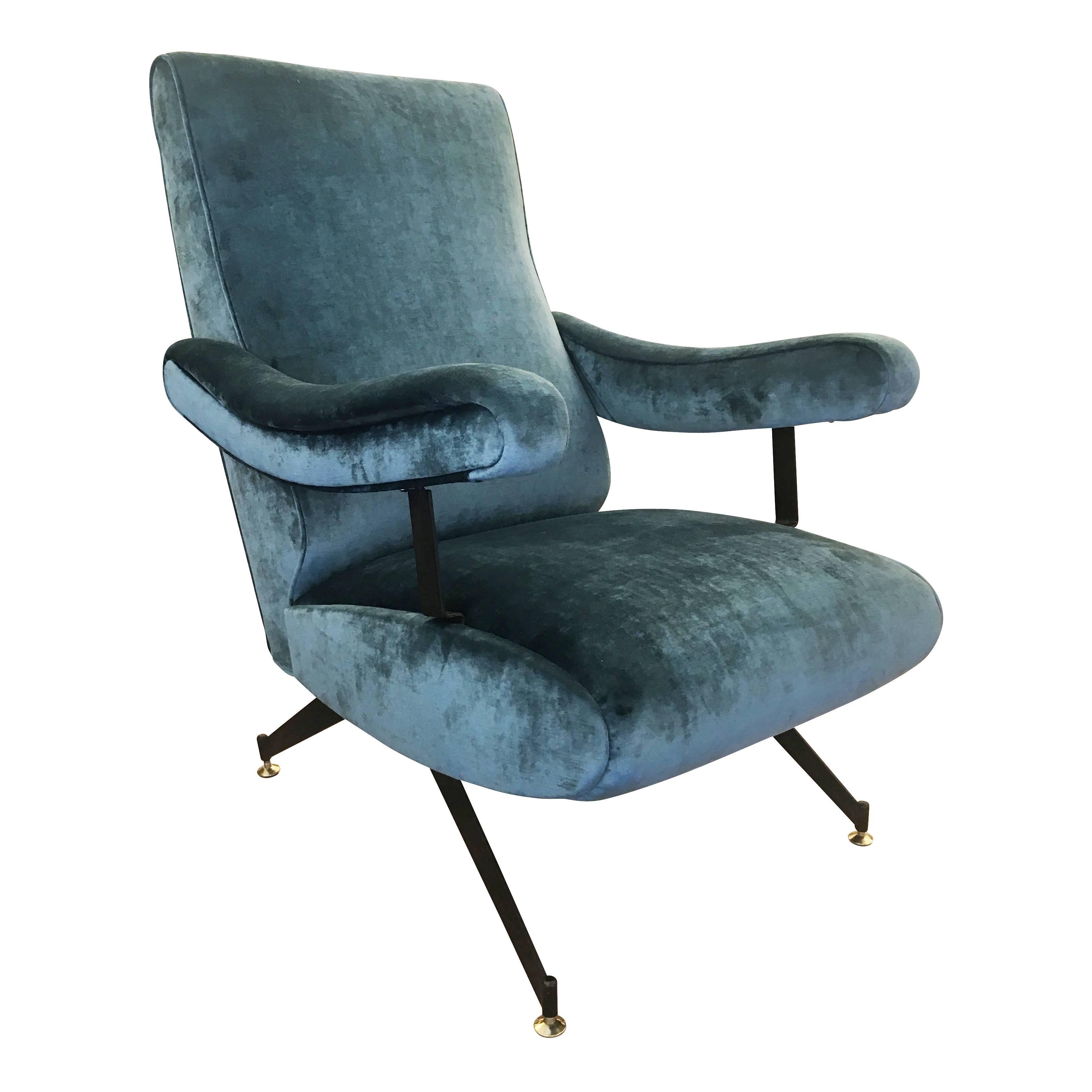 Stylish reclining armchair by Gianni Moscatelli for Formanova. The legs are black lacquered metal with brass feet. Has been re-upholstered in a green velvet.
