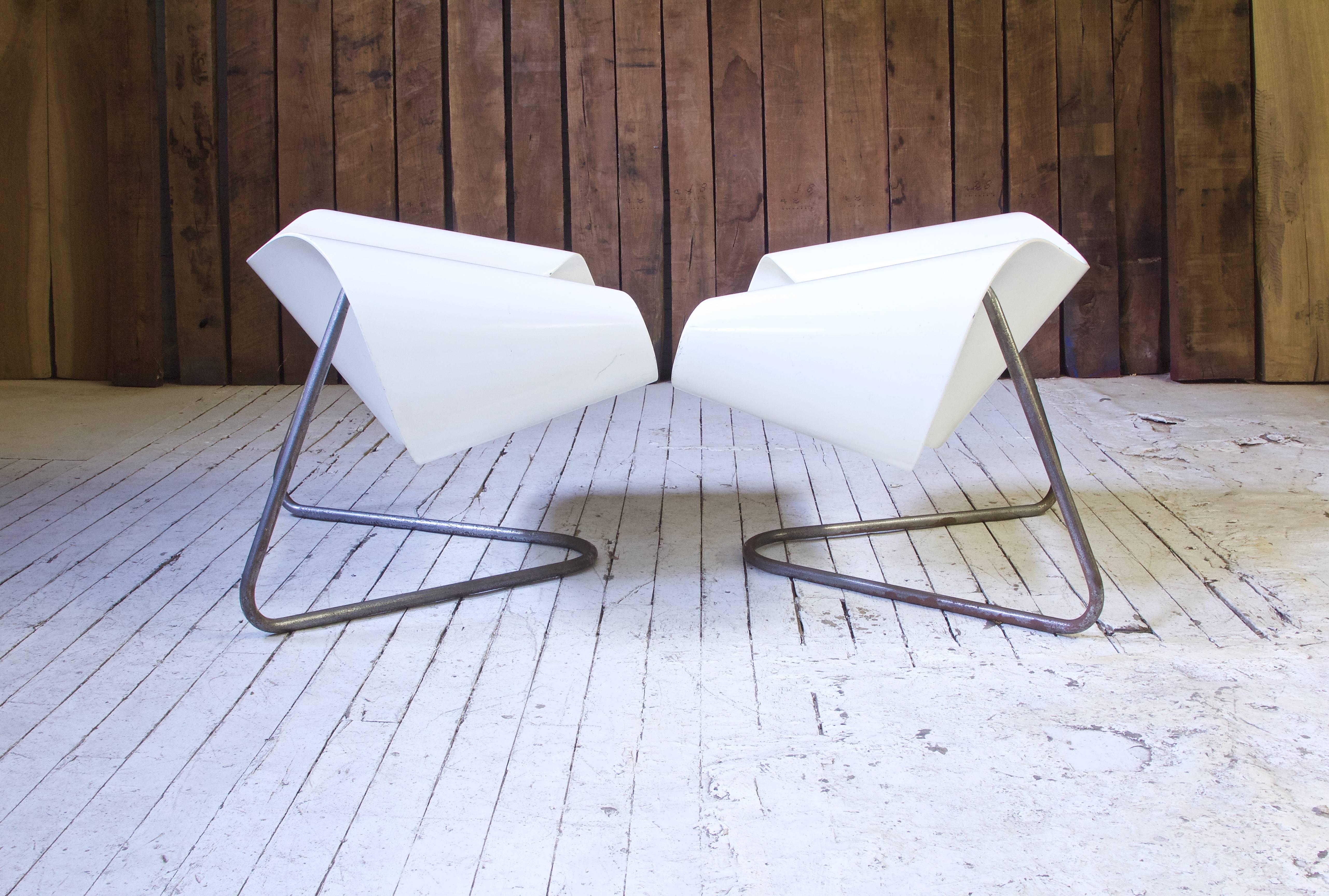 Sculptural, rare CL-9 fiberglass and polished steel lounge chairs by Franca Stagi and Cesare Leonardi for Bernini, 1961. Incredible lines, extremely comfortable; awesome examples of Italian experimental design of the mid-20th century.

(One chair