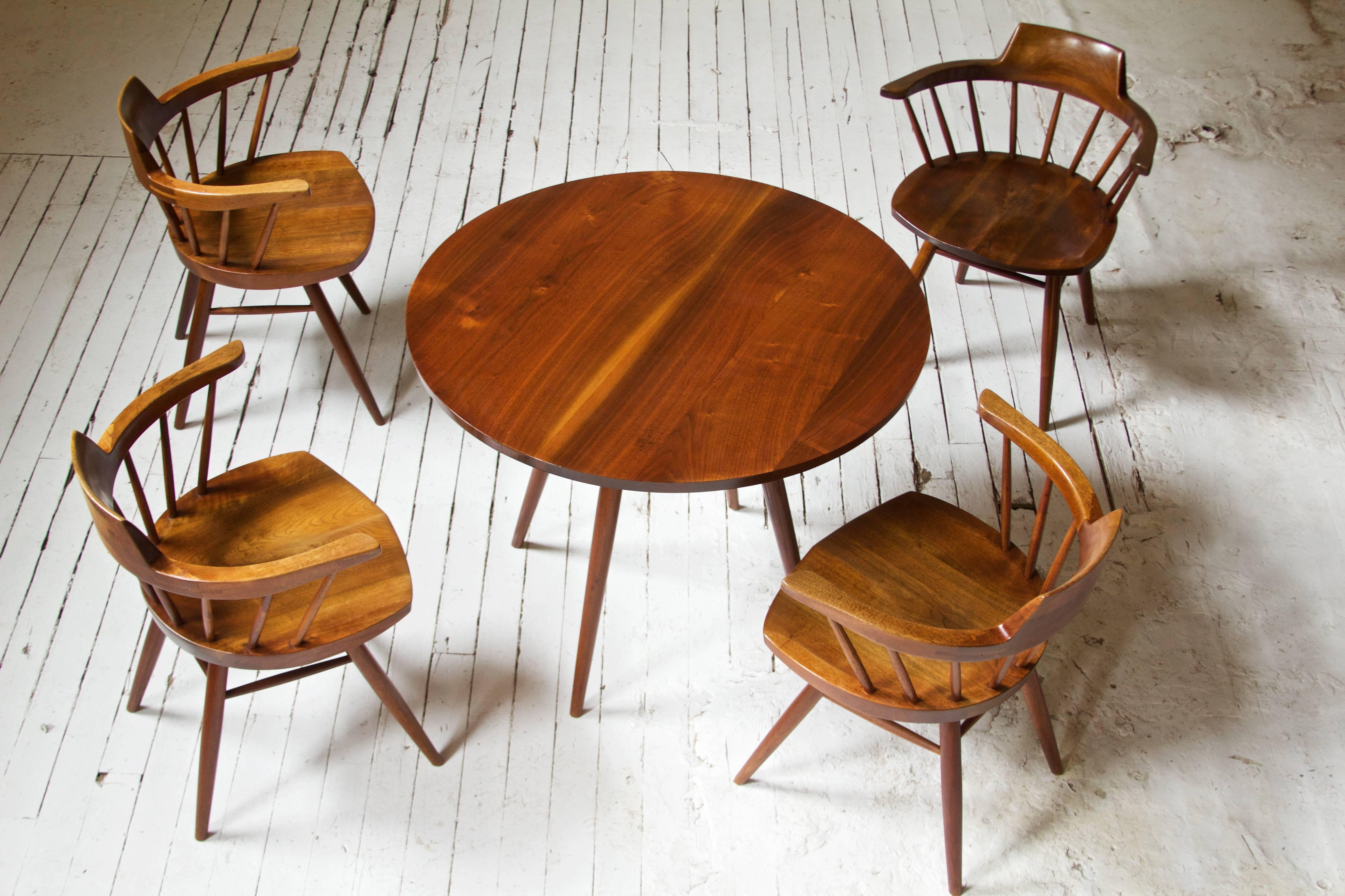 Mid-Century Modern Rare George Nakashima Walnut Dining Set with Four Captain's Chairs