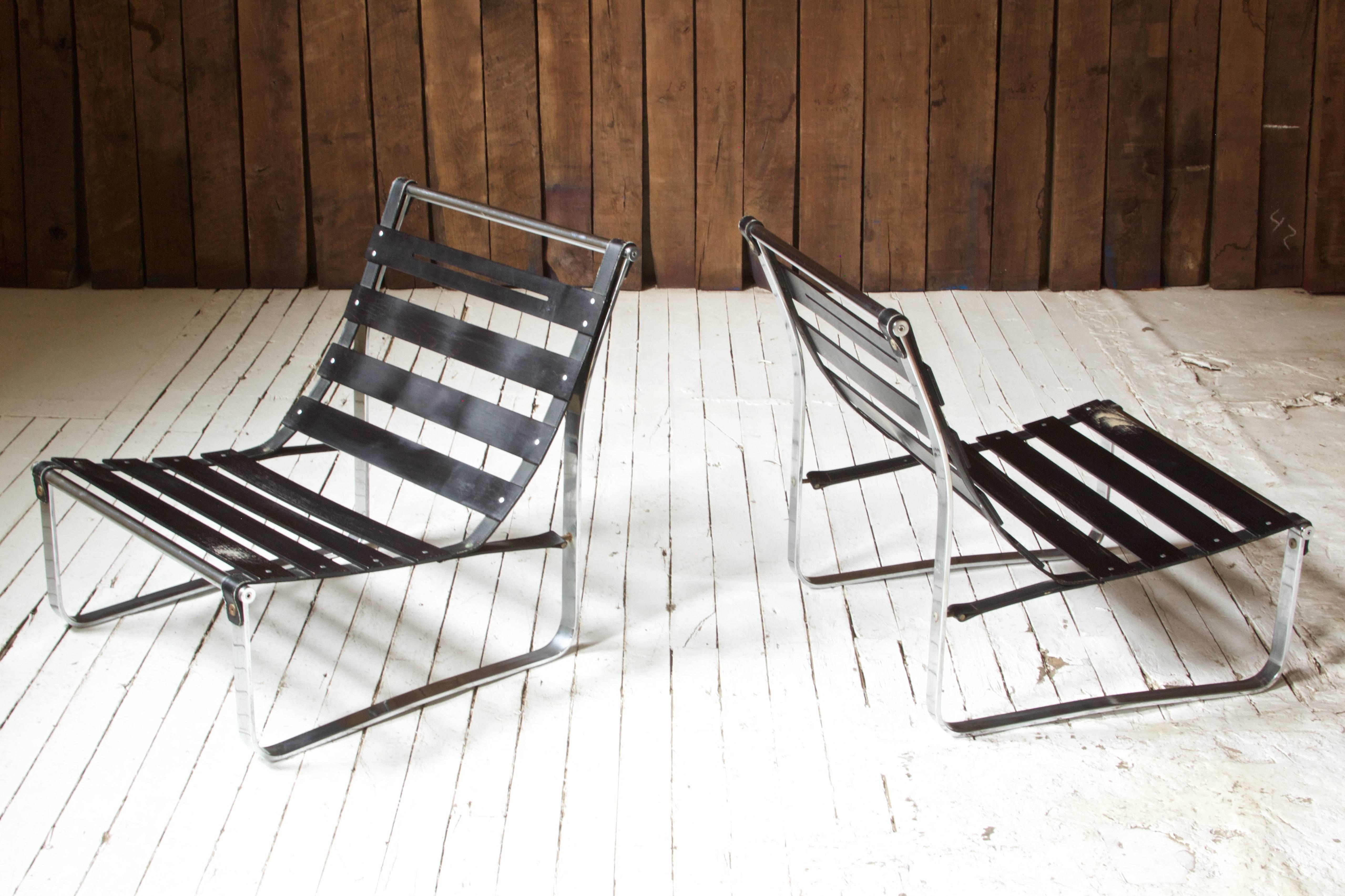 Vintage pair of chrome-plated steel, leather and painted-wood lounge chair frames attributed to Kho Liang Ie for Artifort; 1960s. This design allows the frames to flex under the weight of a sitter, making for a very comfortable and weightless seat.