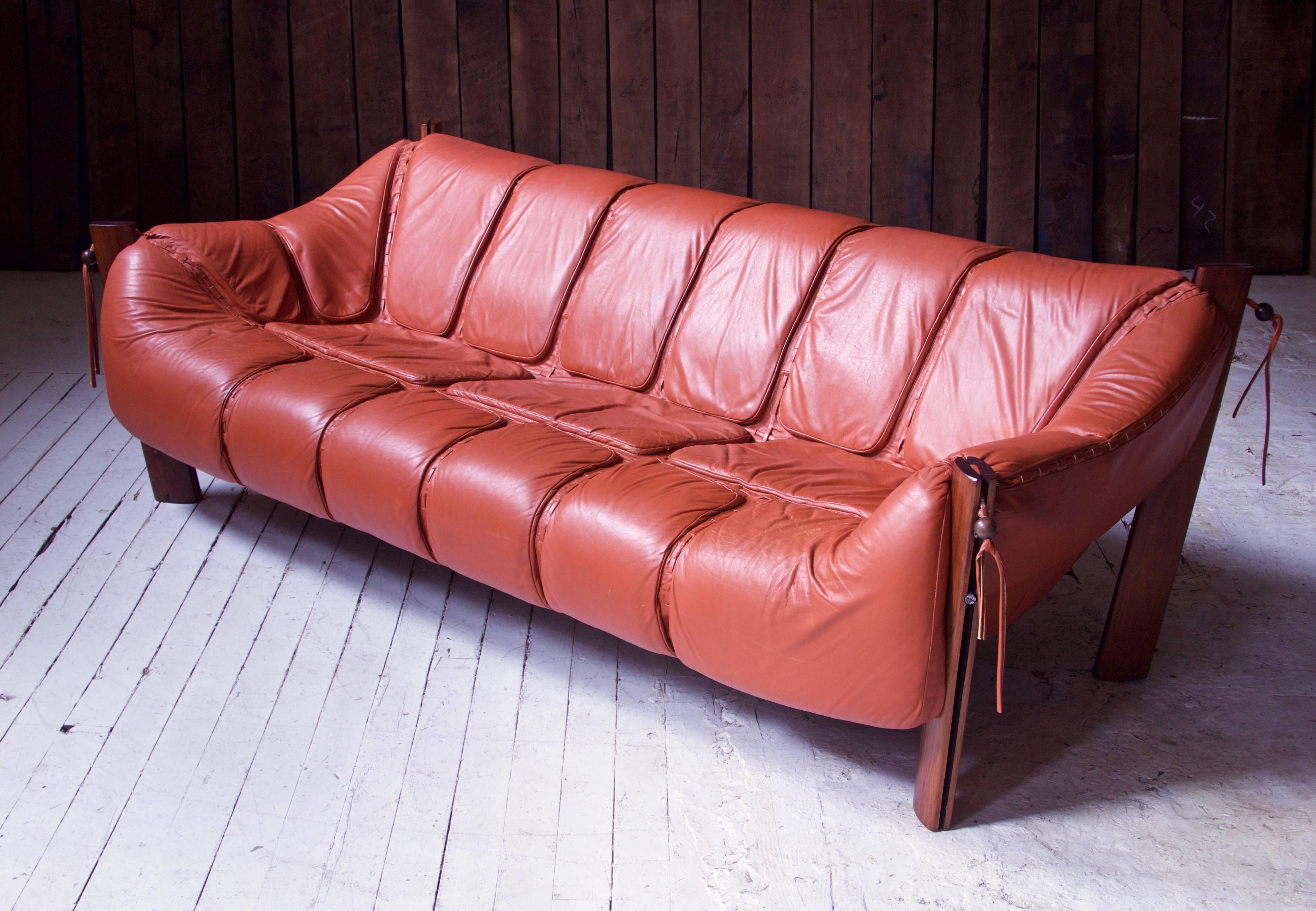A well-preserved vintage Percival Lafer MP-211 Brazilian rosewood and leather full-size sofa made in Sao Paolo, Brazil by Lafer S.A Ind. e Com, circa 1975. This piece has come from the Carmel, NY estate of the original owner, has seen minimal usage