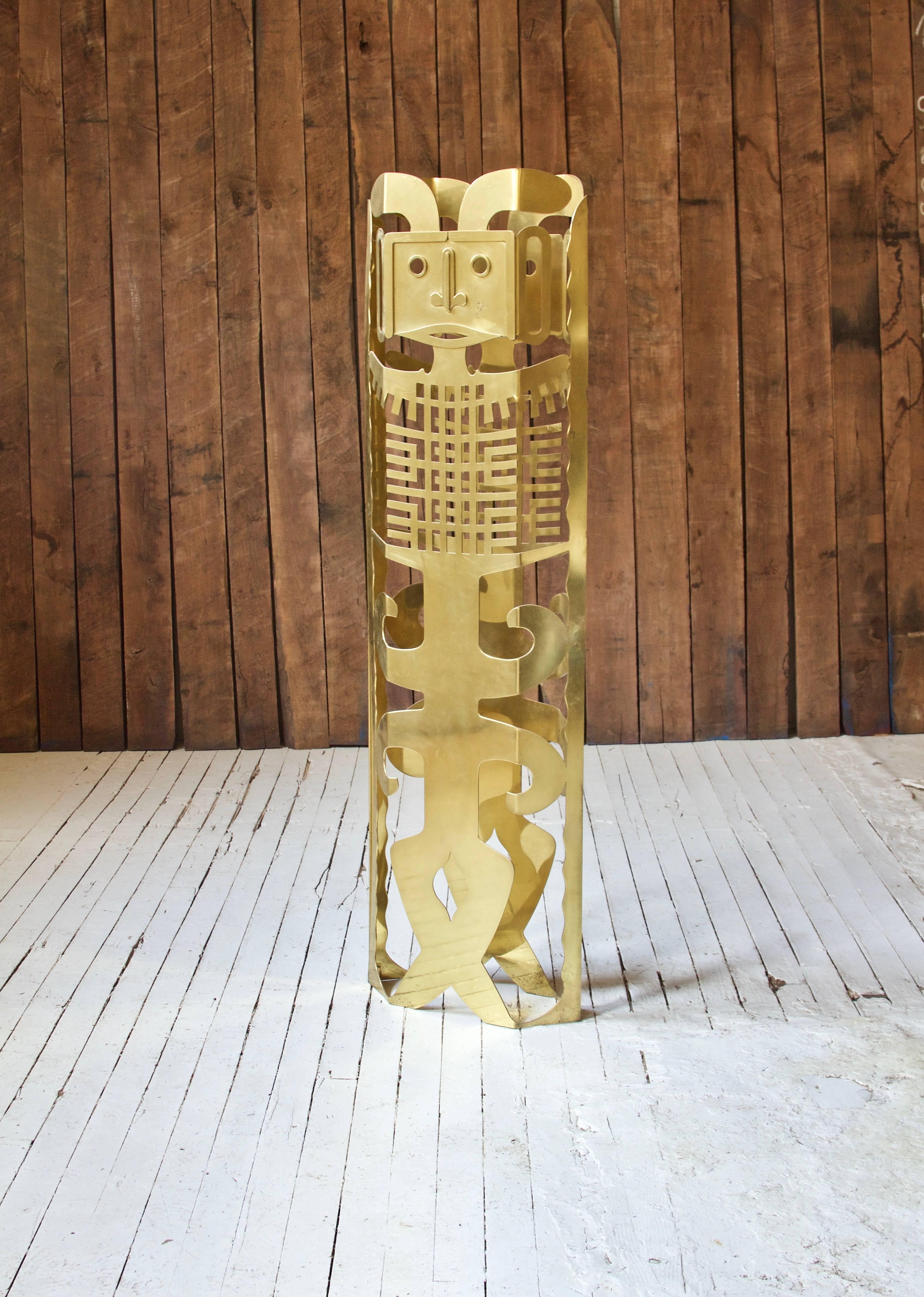 Impressive TOTEM sculpture by renowned artist Robert Zeidman (1915-1996) in cut and polished solid brass. A unique figurative example of Zeidman's mostly abstract totemic metal sculpture; this piece draws inspiration from as it's title suggests the