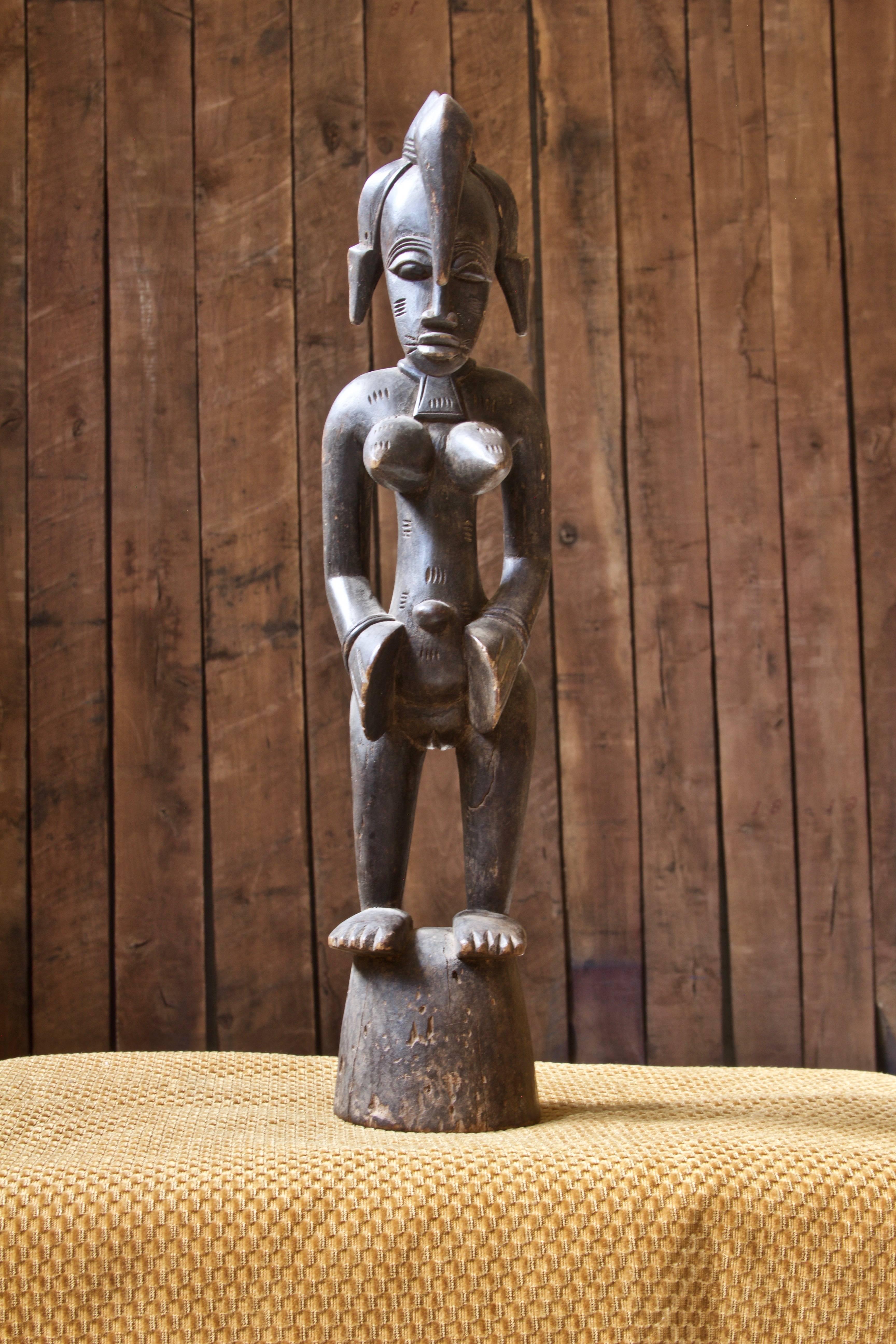wooden fertility statue