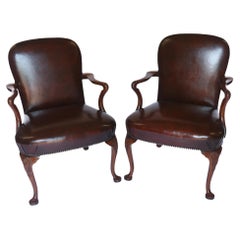 Pair Georgian Revival Walnut & Leather open elbow chairs