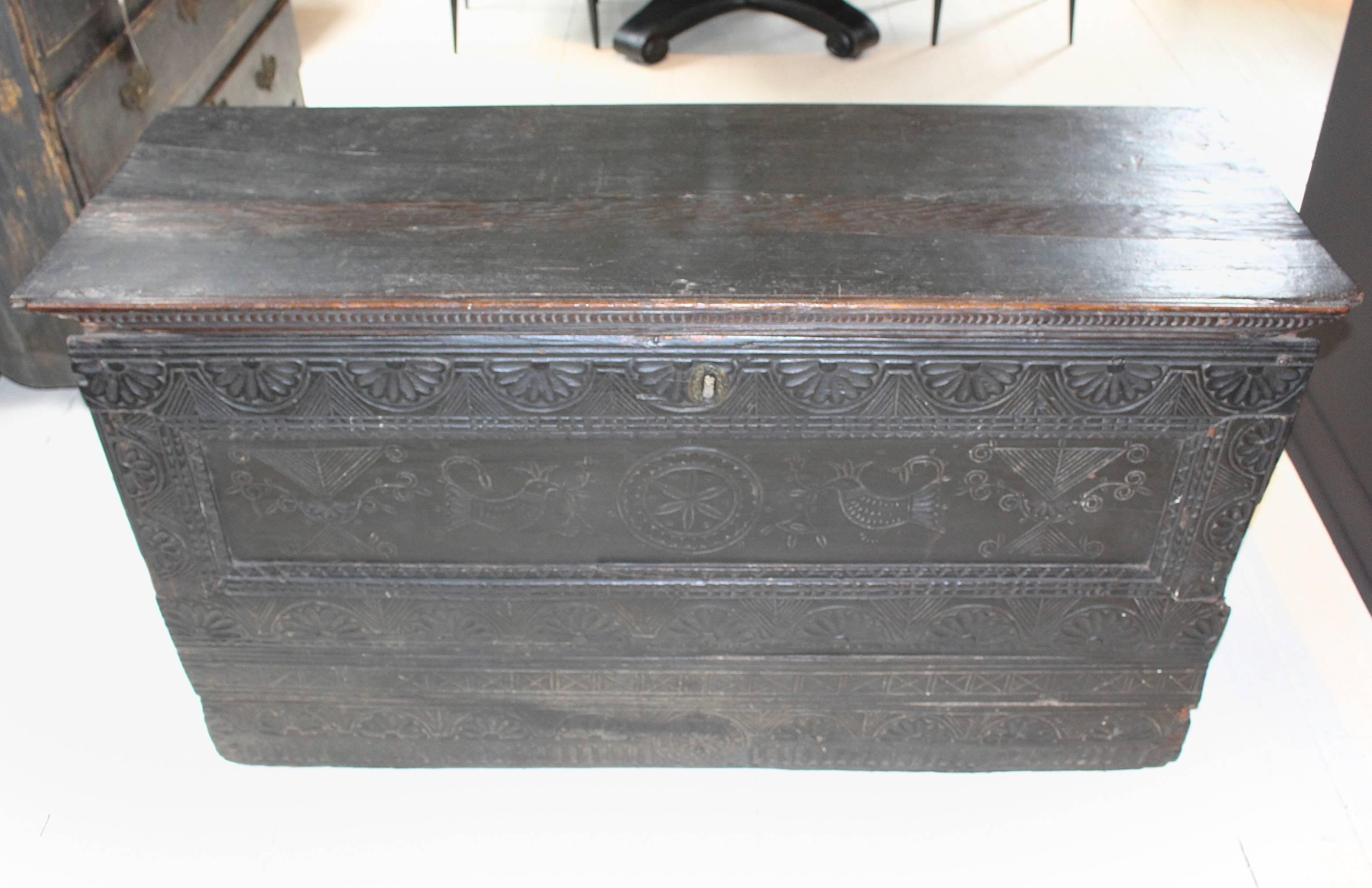 18th century oak chest, probably Eastern European, with elaborately carved front.