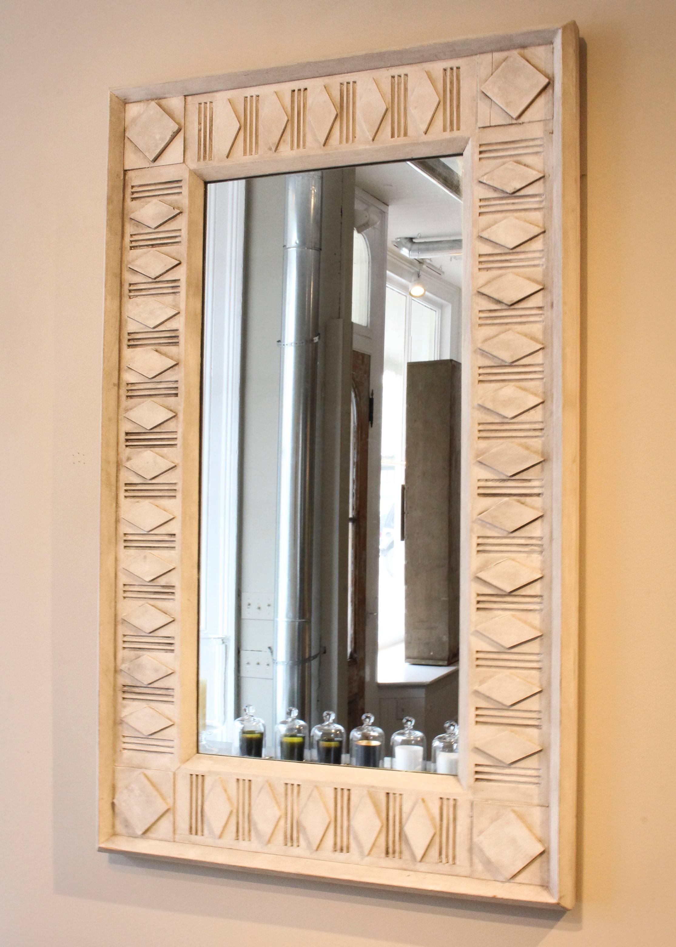 Architectural framed decorative mirror, 21st century, in reclaimed wood refreshed with oyster paint.