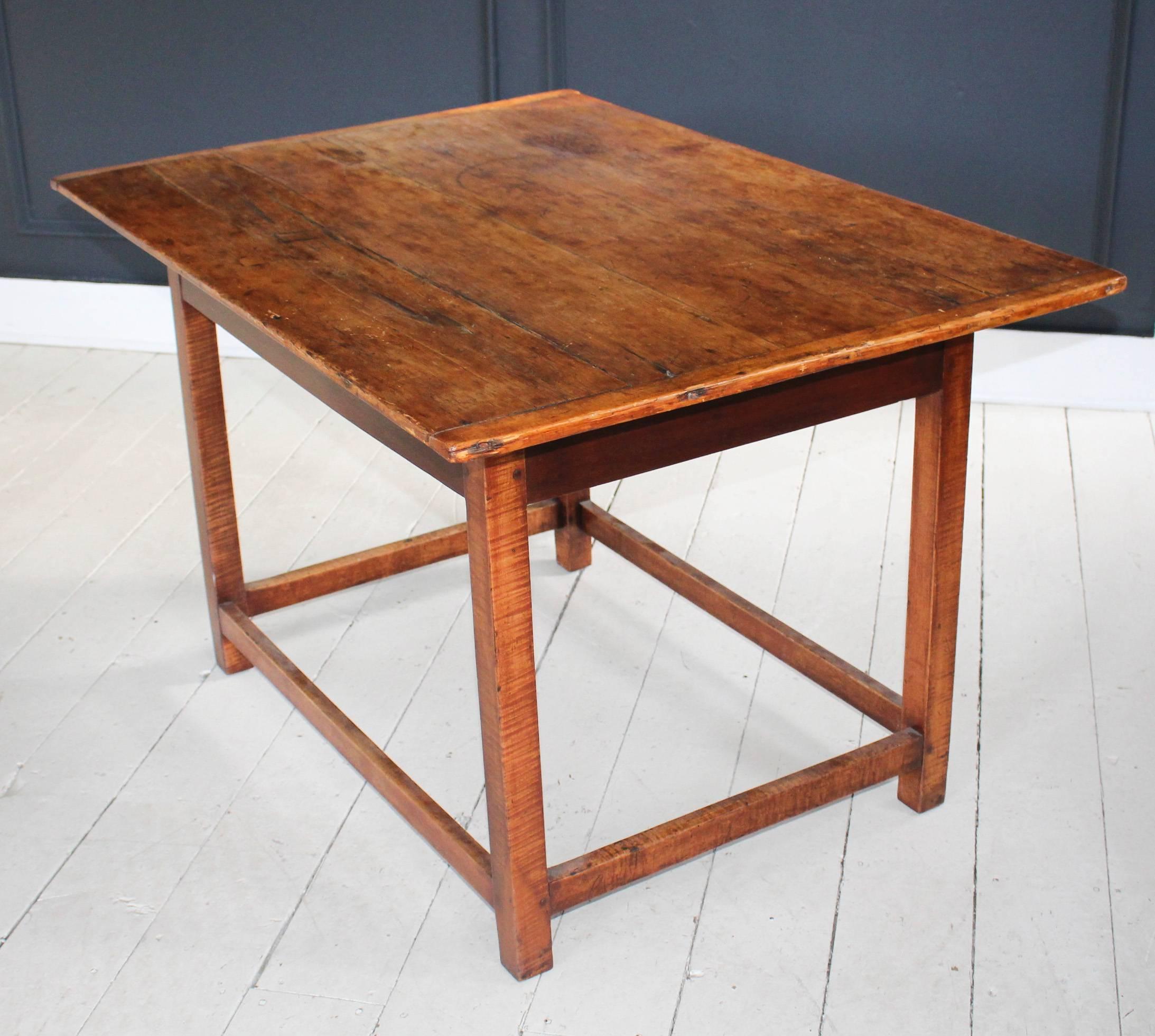 White pine two-board table, 18th century Pennsylvania, with bread board ends and stretcher base.
