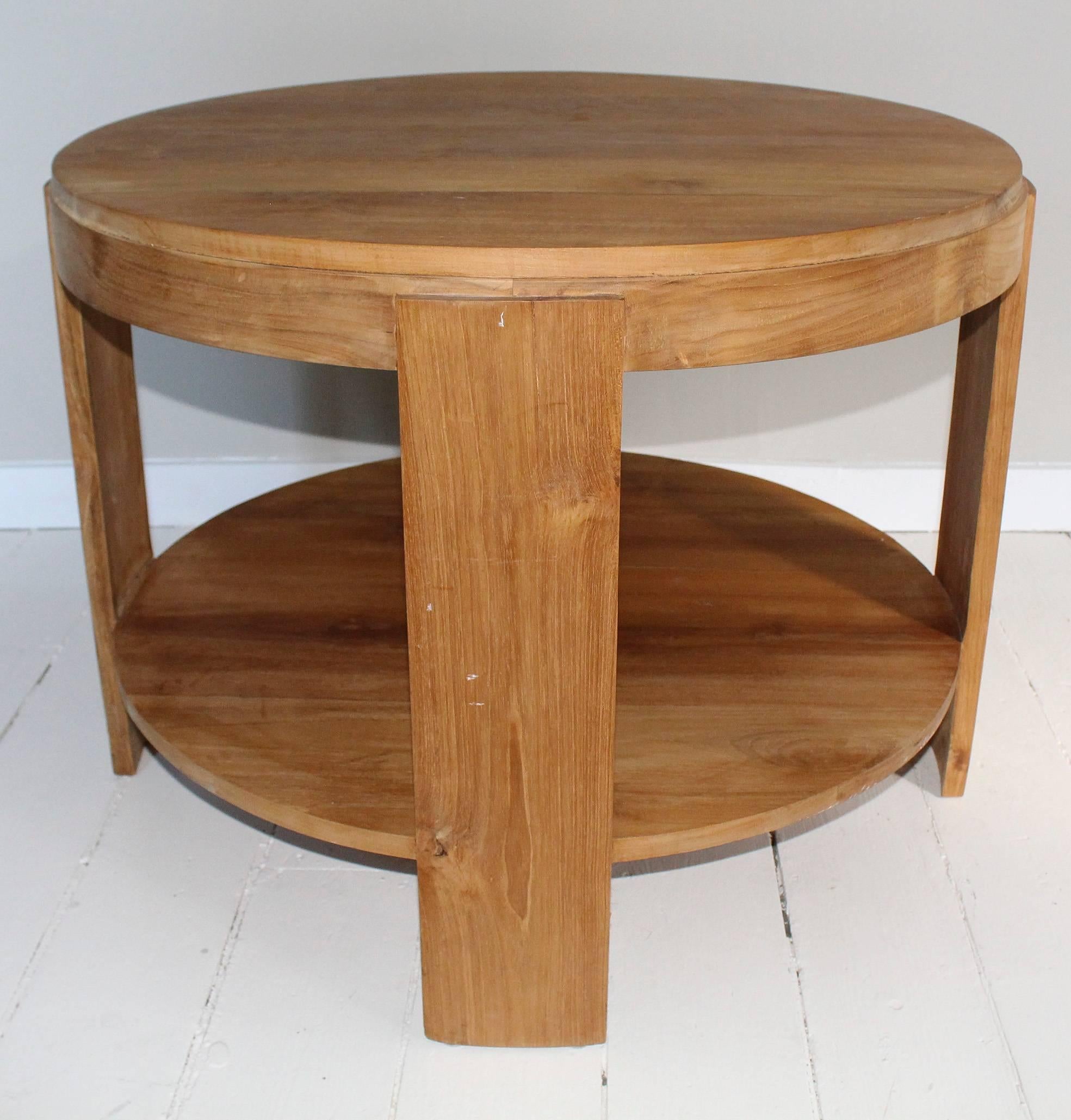 Modern circular two-tier table in bleached oak.