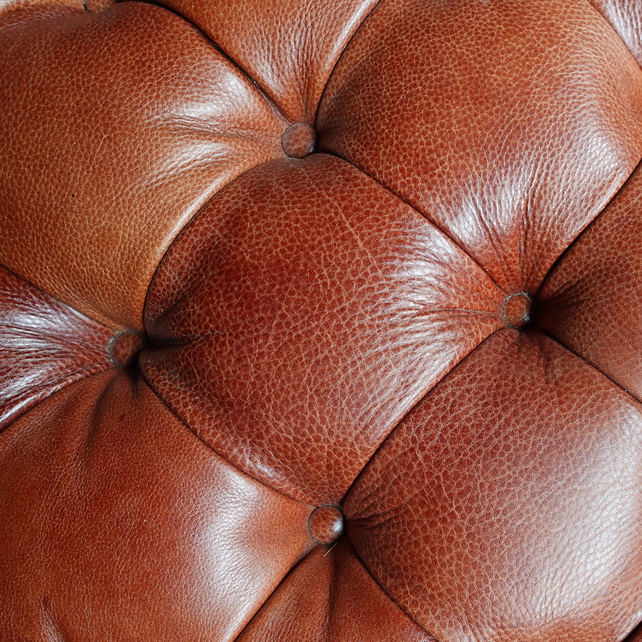 Large Custom Made Fine Tufted Leather Ottoman

Anonymous
North America; 21st century or late 20th century
Leather, wood, brass

Approximate size: 17 (h) x 53 (w) x 53 (d) in.

Dominating the space with its generous proportions, this truly