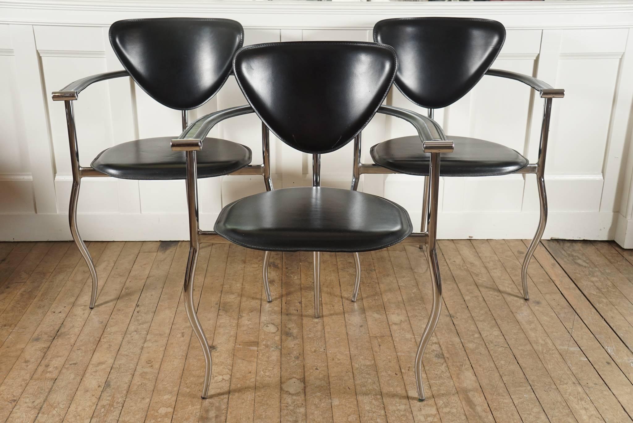 Set of six Arrben Stiletto armchairs, chrome frame, cabriole legs, knuckle arm, stitched black leather seat with triangular back.