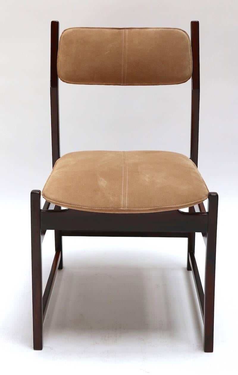 Set of eight 1960s L'Atelier dining chairs in jacaranda wood, upholstered in beige / tan suede.