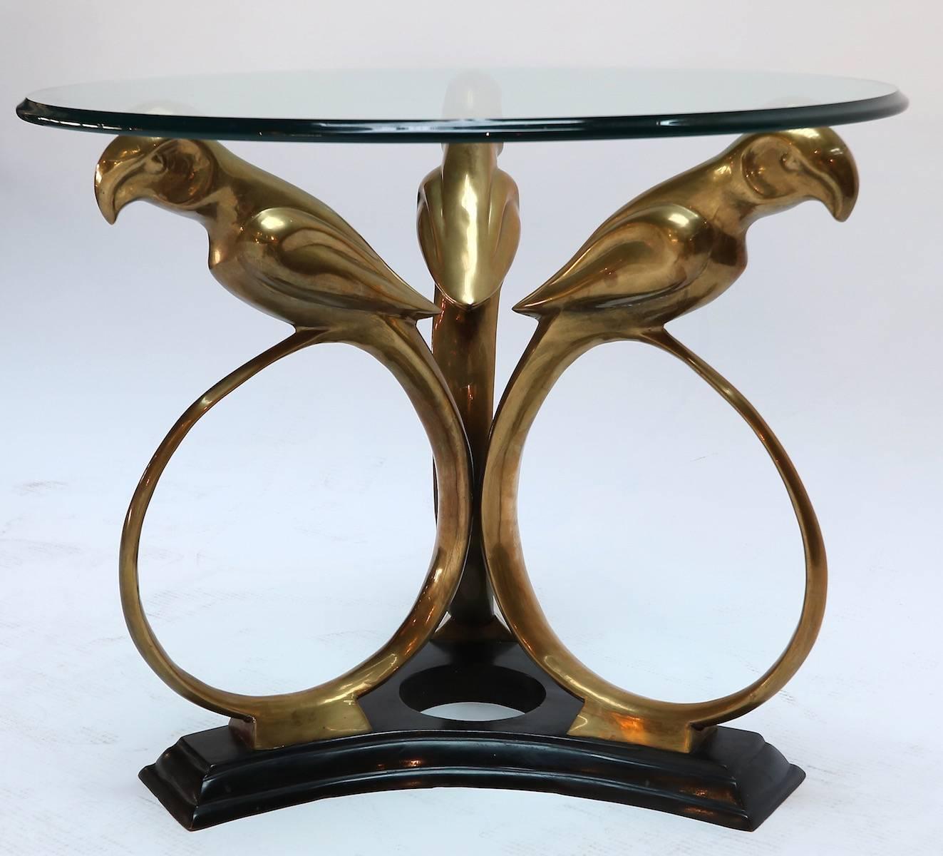 Brass and metal 1960s side table with parrot base and glass top.