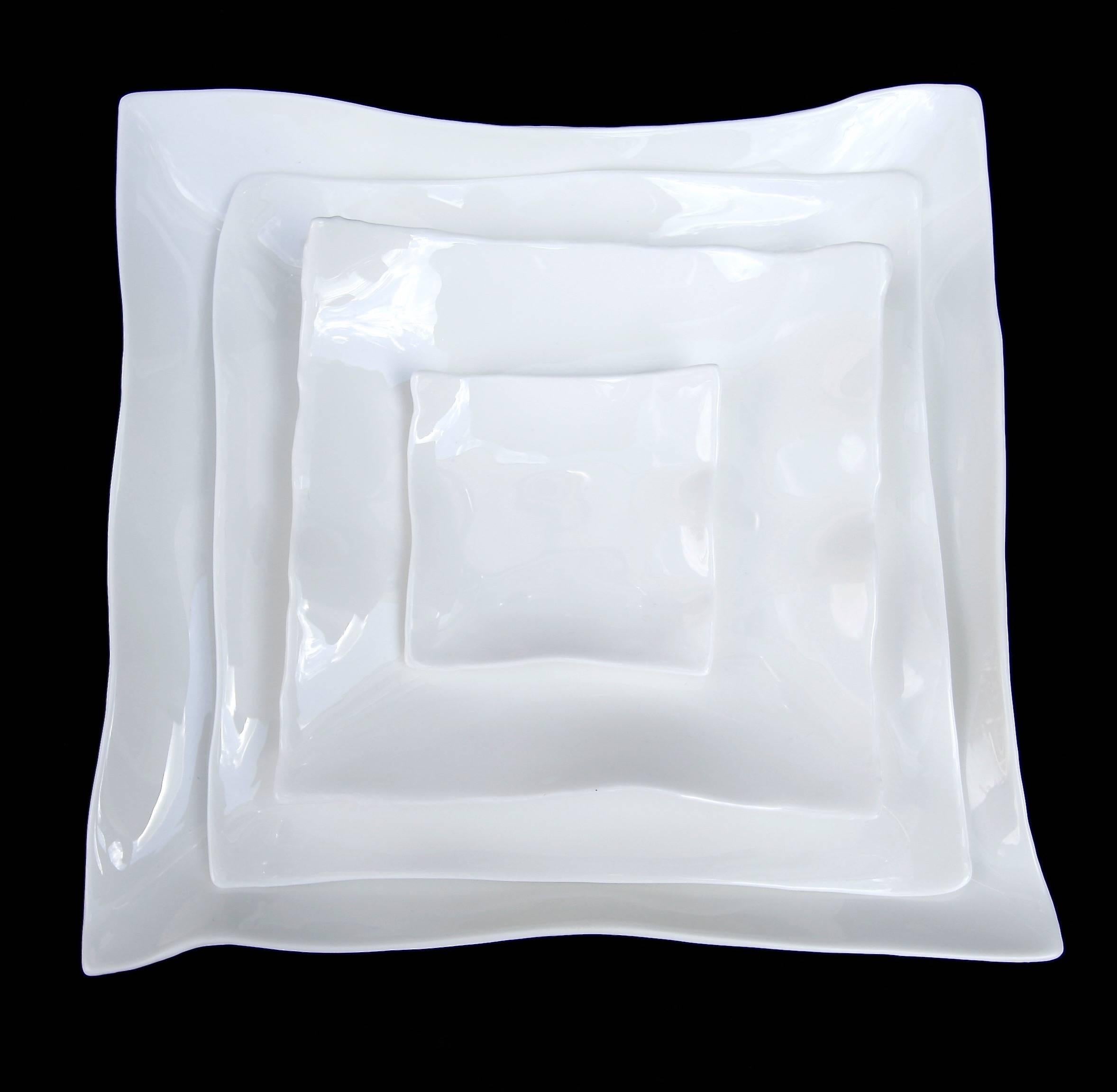 Square white bone china tableware by Roos Van de Velde from the line perfect imperfection for Serax. Priced individually.

Plates:
Measures: Mini $32 (3.5