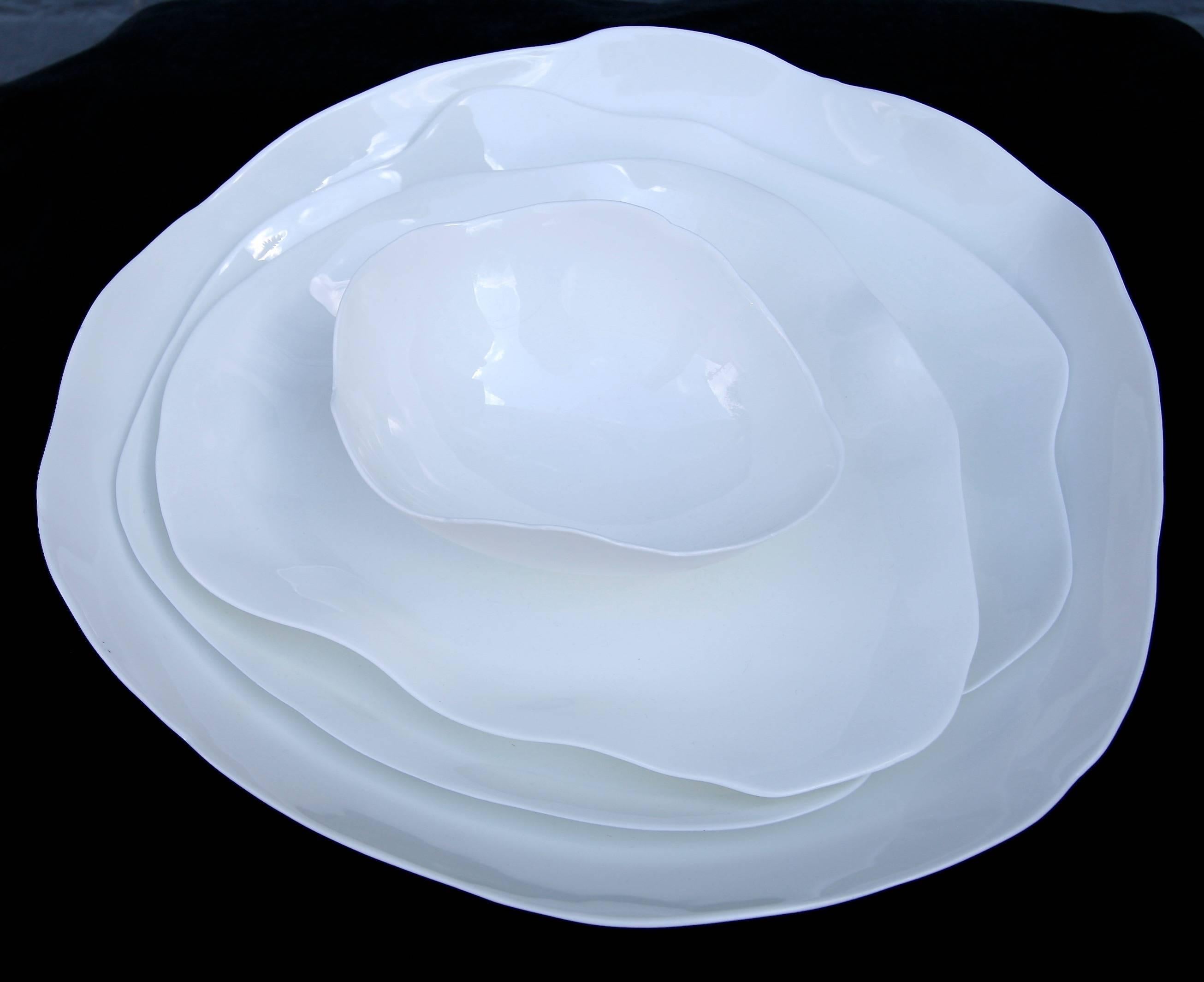 Stunning white bone china tableware by Roos Van de Velde from the line perfect imperfection for Serax. Priced individually not as a set.

Measures: Bowl $65 (6.25