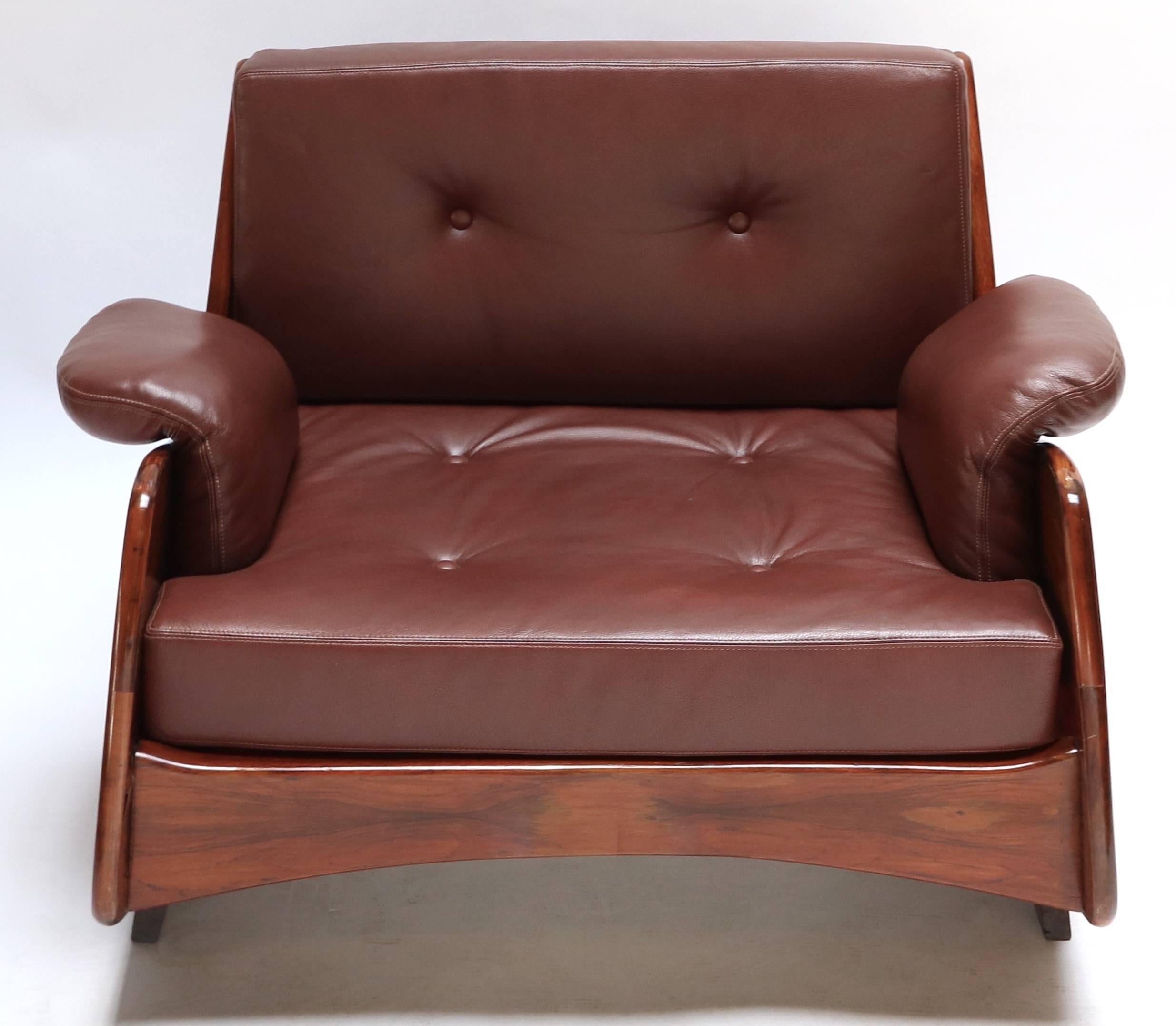 Pair of 1960s Brazilian jacaranda lounge chairs by Jorge Zalszupin upholstered in burgundy leather.