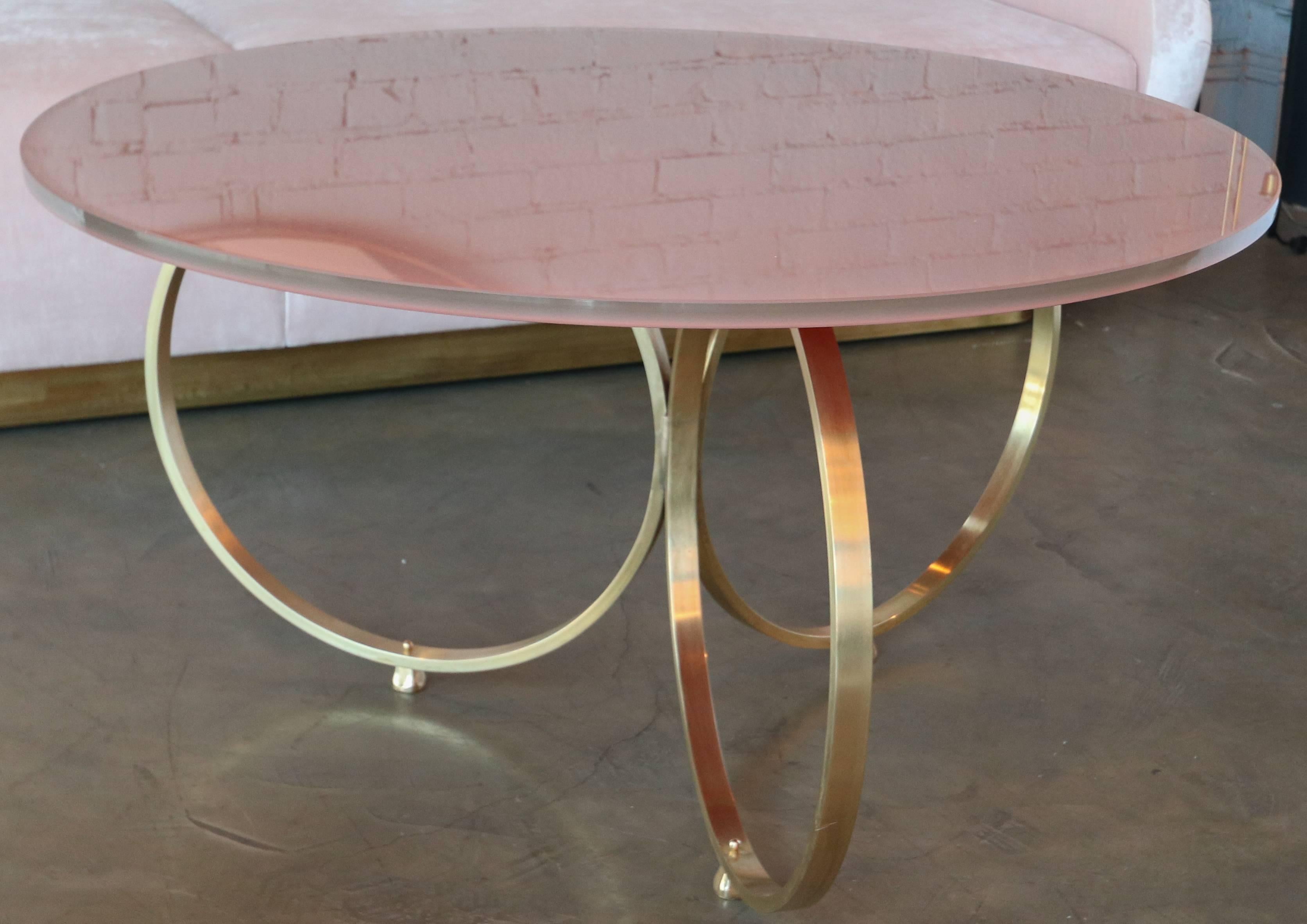 American Custom Brass Coffee Table with Pink Reverse Painted Glass Top by Adesso Imports For Sale