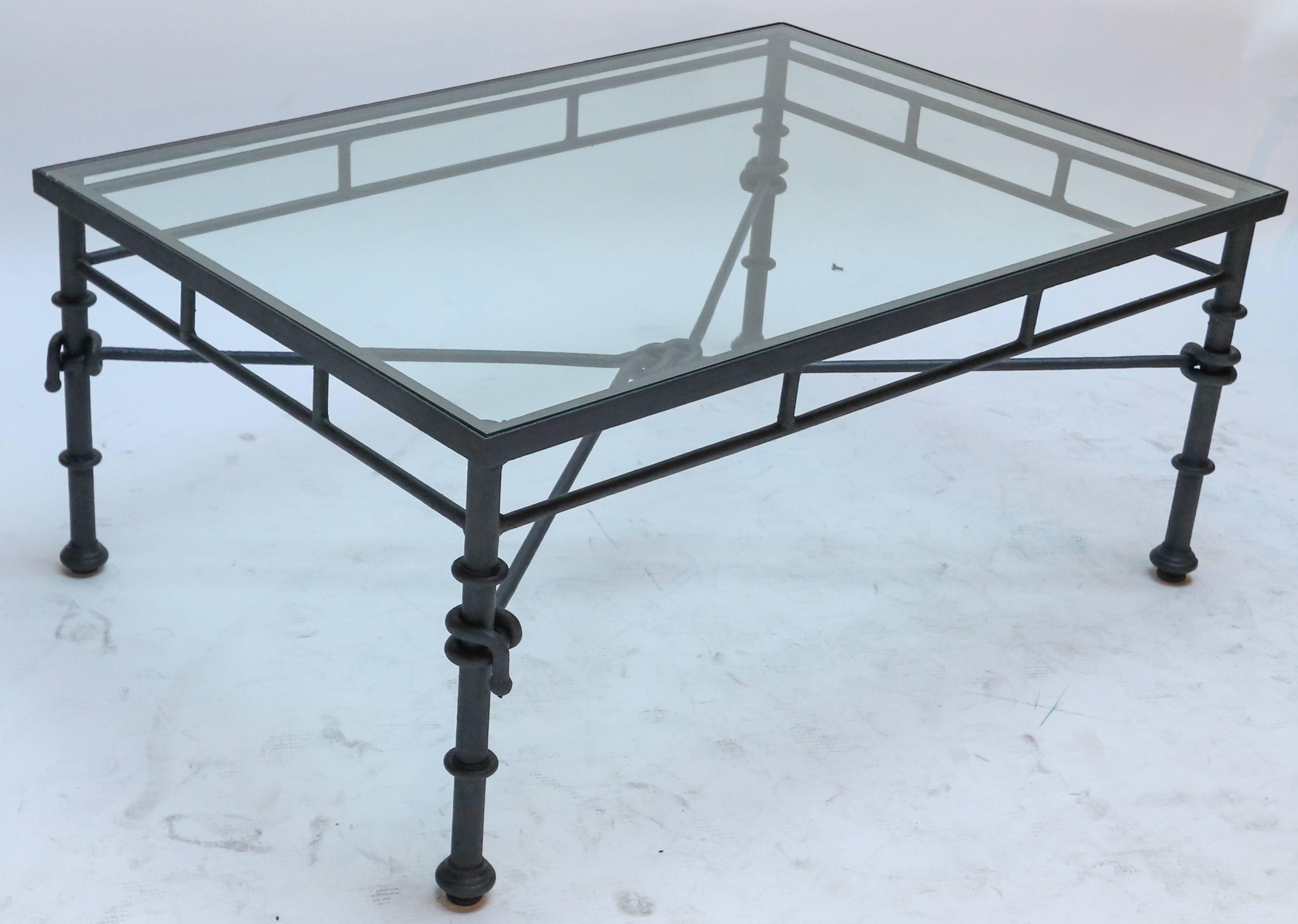 Italian rectangular iron coffee table with knot and rope details with glass top.
