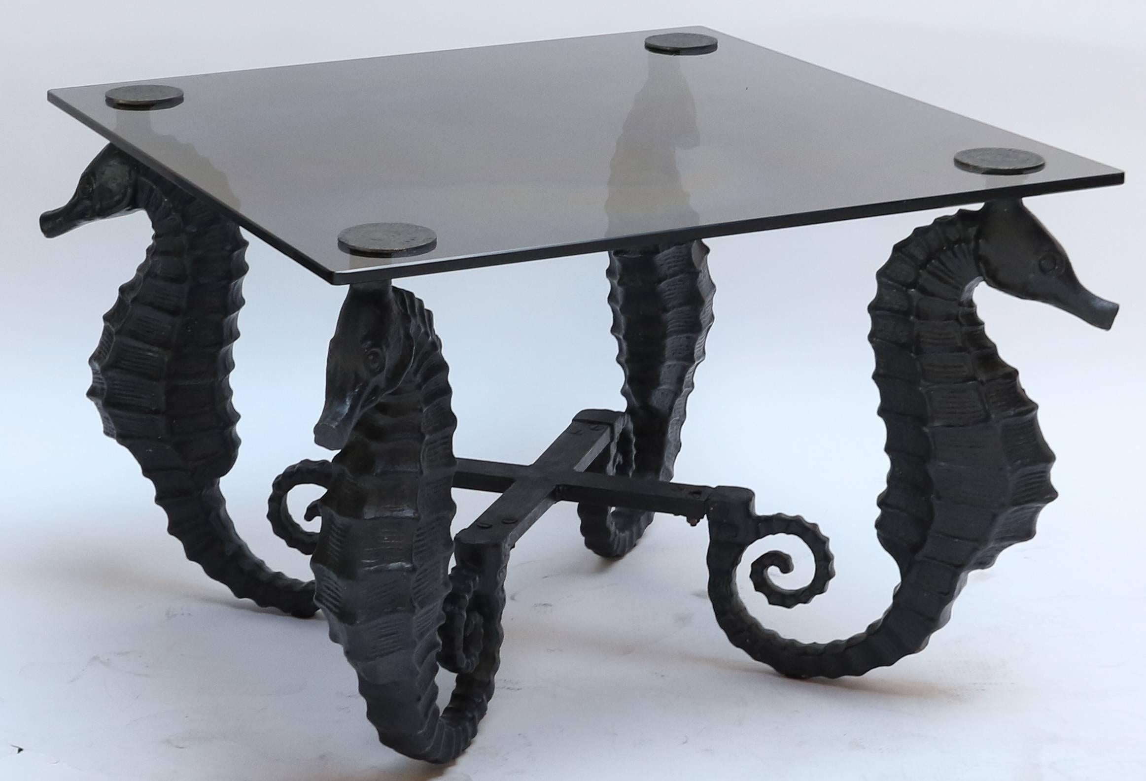 Pair of Black Iron Seahorse Side Tables with Smoked Glass Tops In Good Condition For Sale In Los Angeles, CA