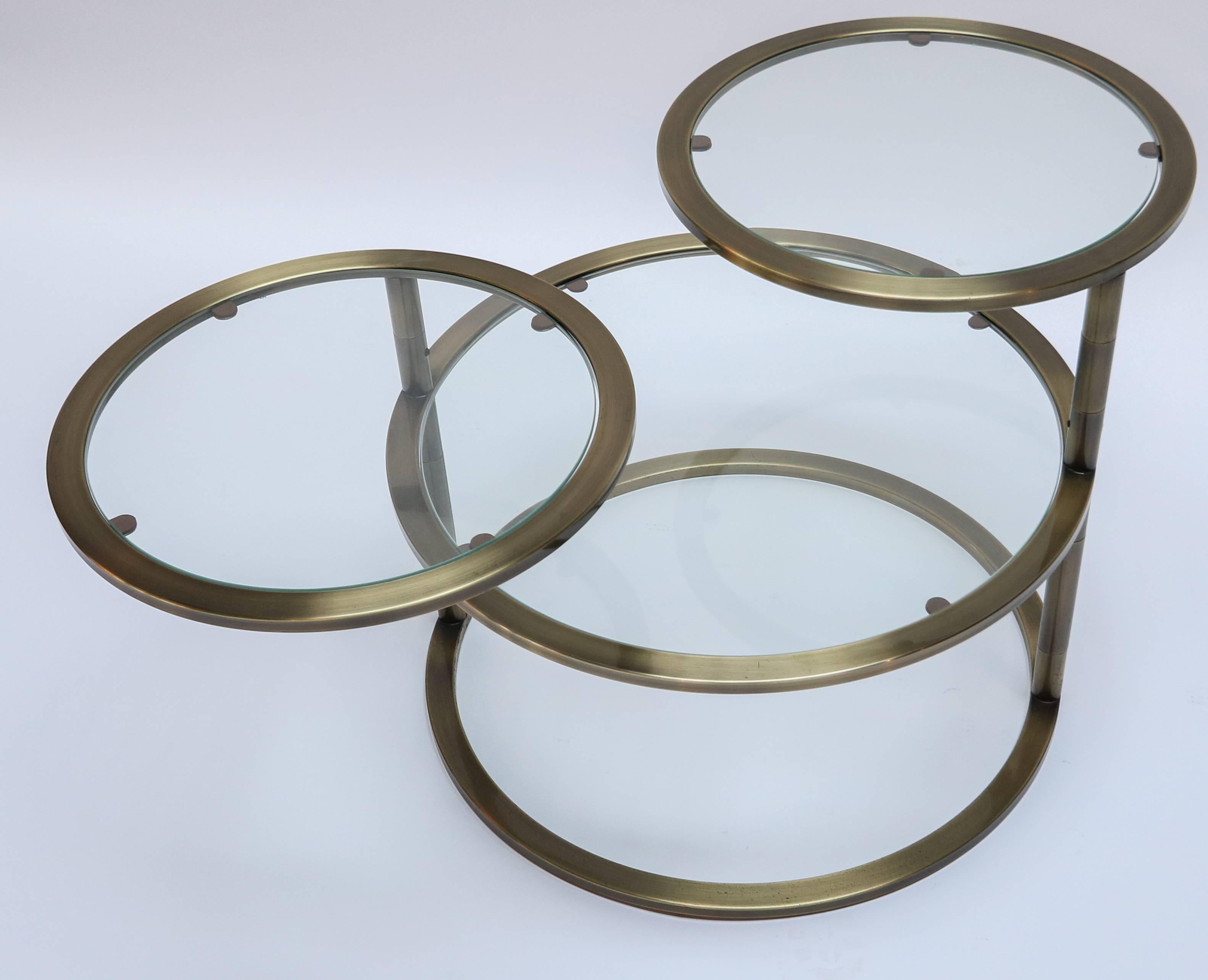 round glass and brass coffee table