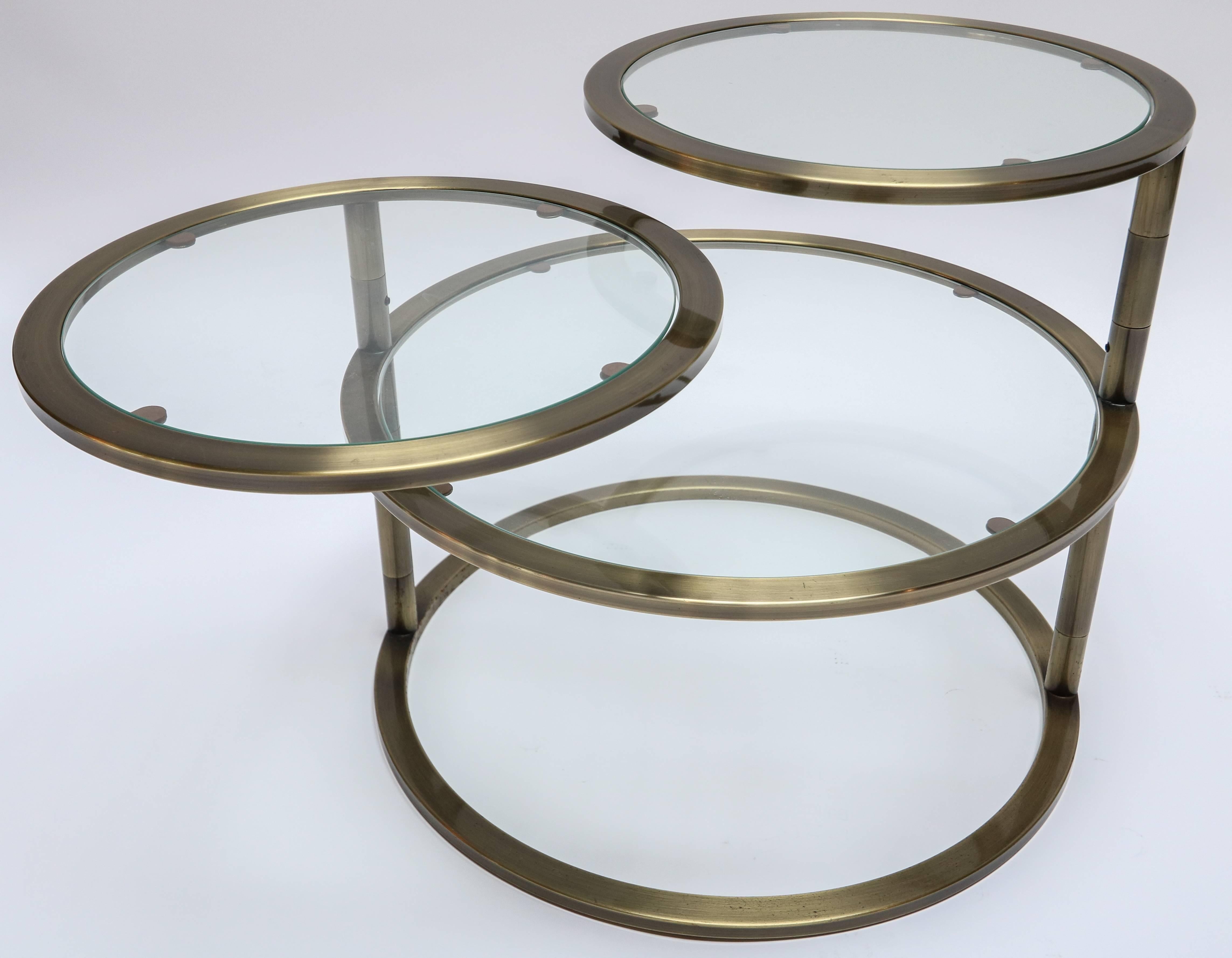 Three-Tiered Brass Coffee / Side Table with Adjustable Round Glass Shelves In Good Condition For Sale In Los Angeles, CA