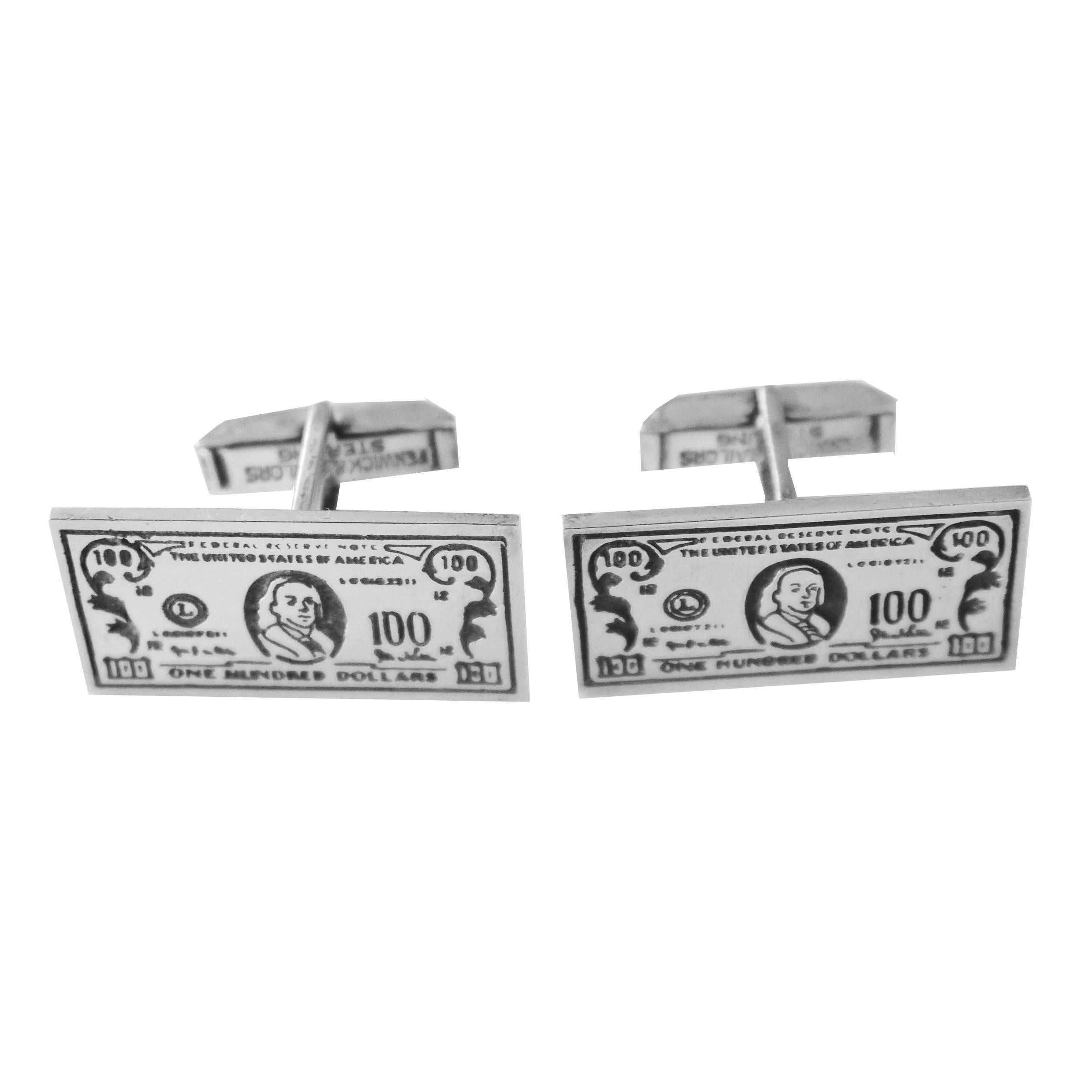 Great pair of 1950s cuff links in the form of 100 dollar bills signed sterling.
Signed Fenwick and Sailors.