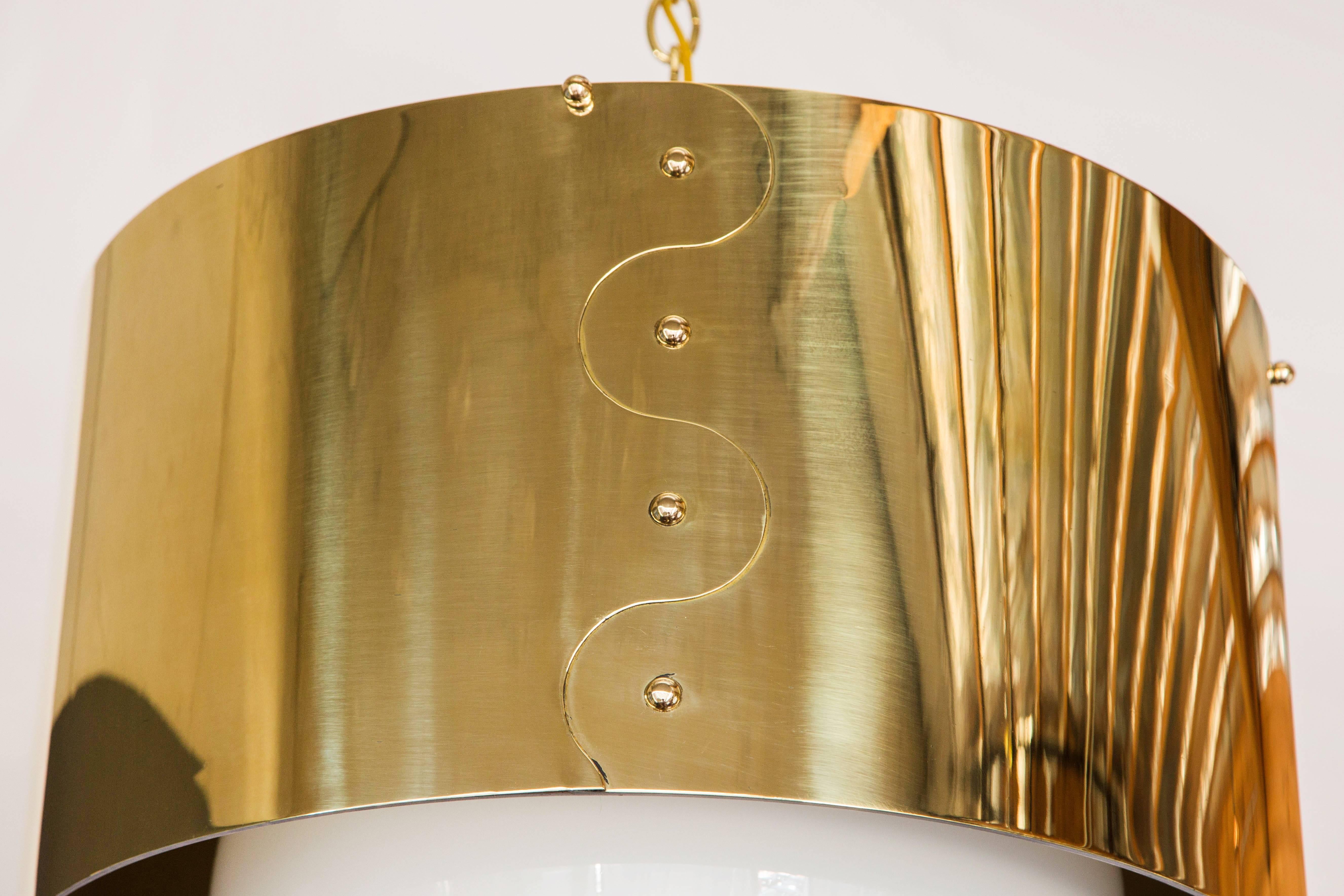 Mid-Century brass drum shaded pendant or chandelier. This has been restored with new brass, electrical and globes. Since this is vintage, there are slight age-commensurate imperfections such as small dimples, minimal torqueing, this is not new or