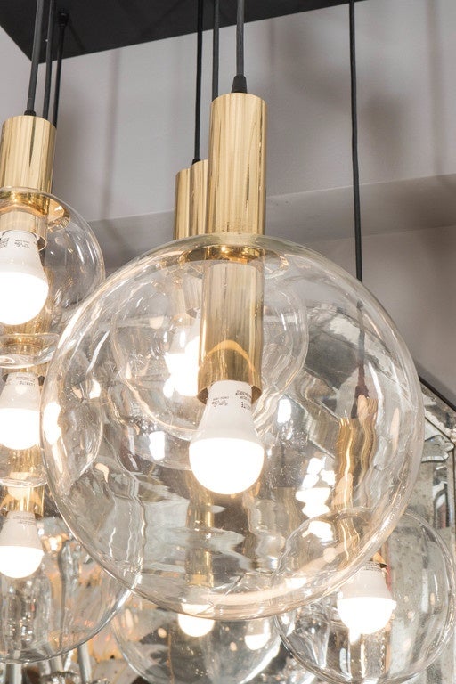 Custom 8 globe Brass and Black chandelier