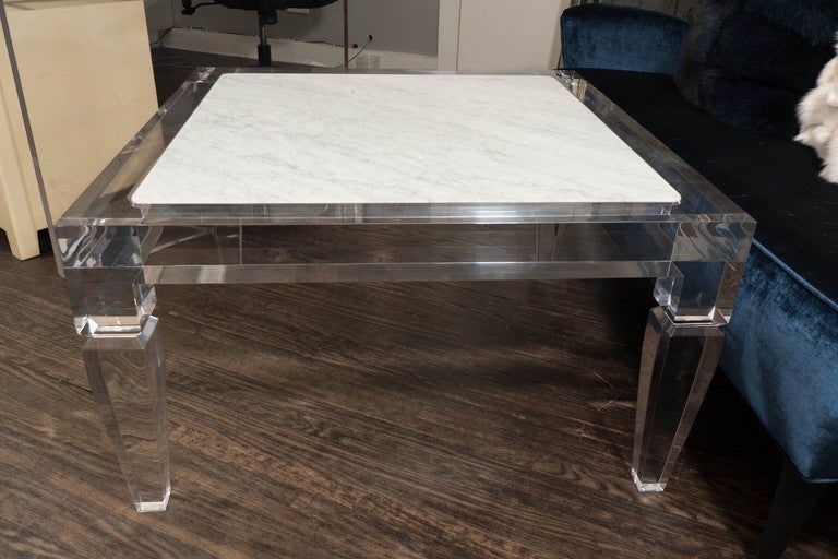 Custom Lucite table with Carrara marble inset top. Customization is available in different sizes.