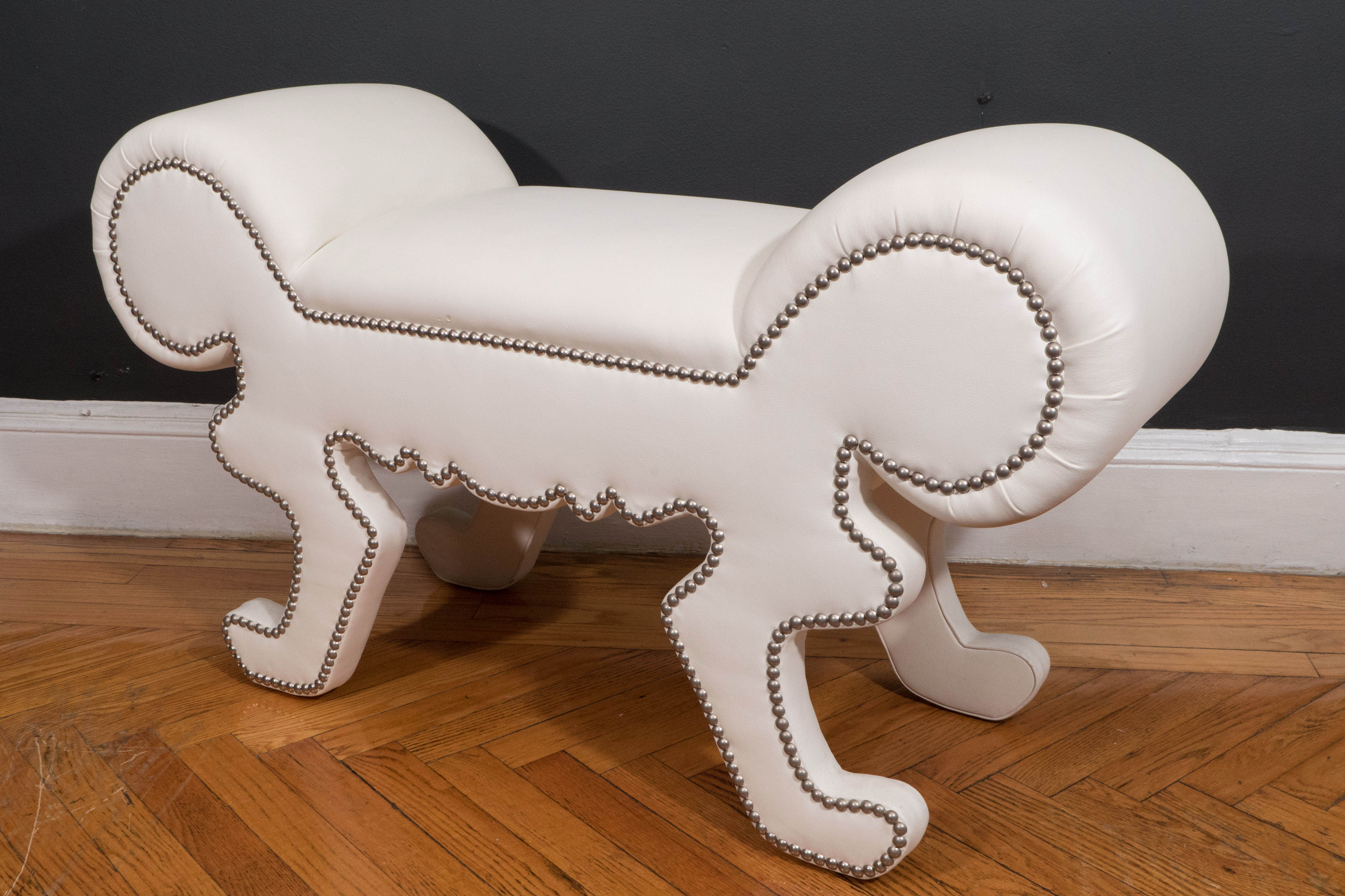 white faux leather bench