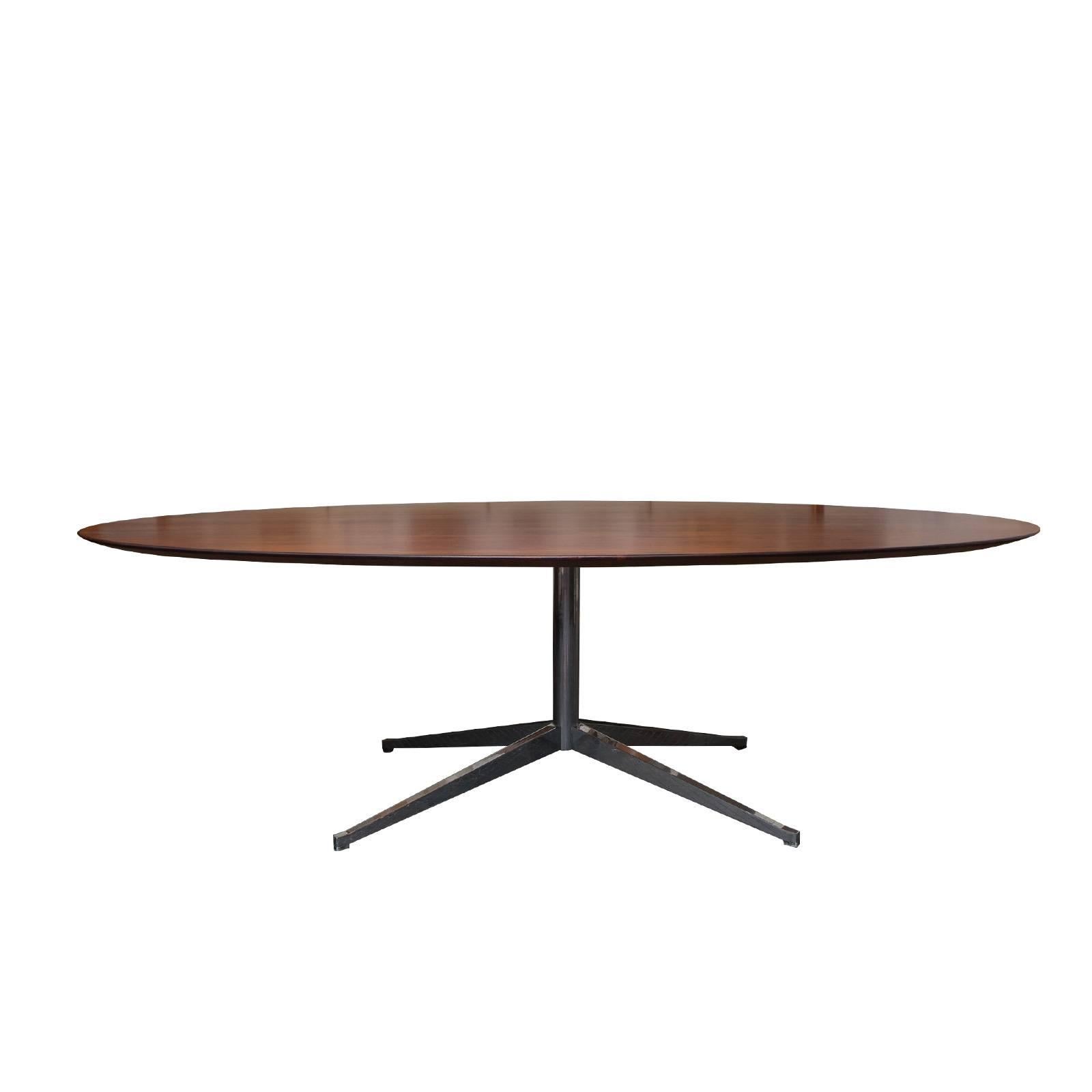 Beautifully figured rosewood oval dining table, mfg. Knoll-1960s.