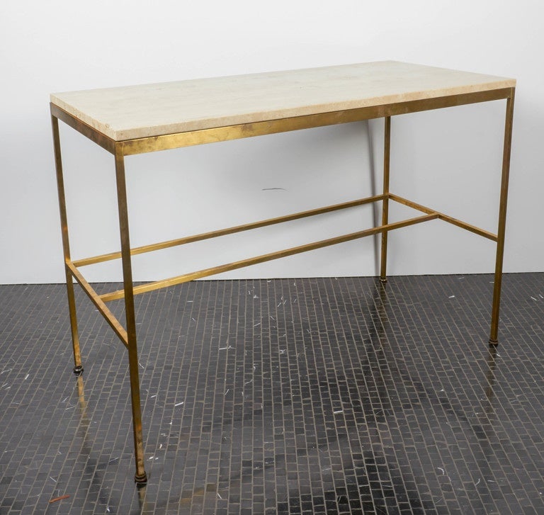 Paul McCobb travertine and brass console table, manufactured by Calvin, 1950s. Console has the original travertine and all 4 feet. (1 sold).
