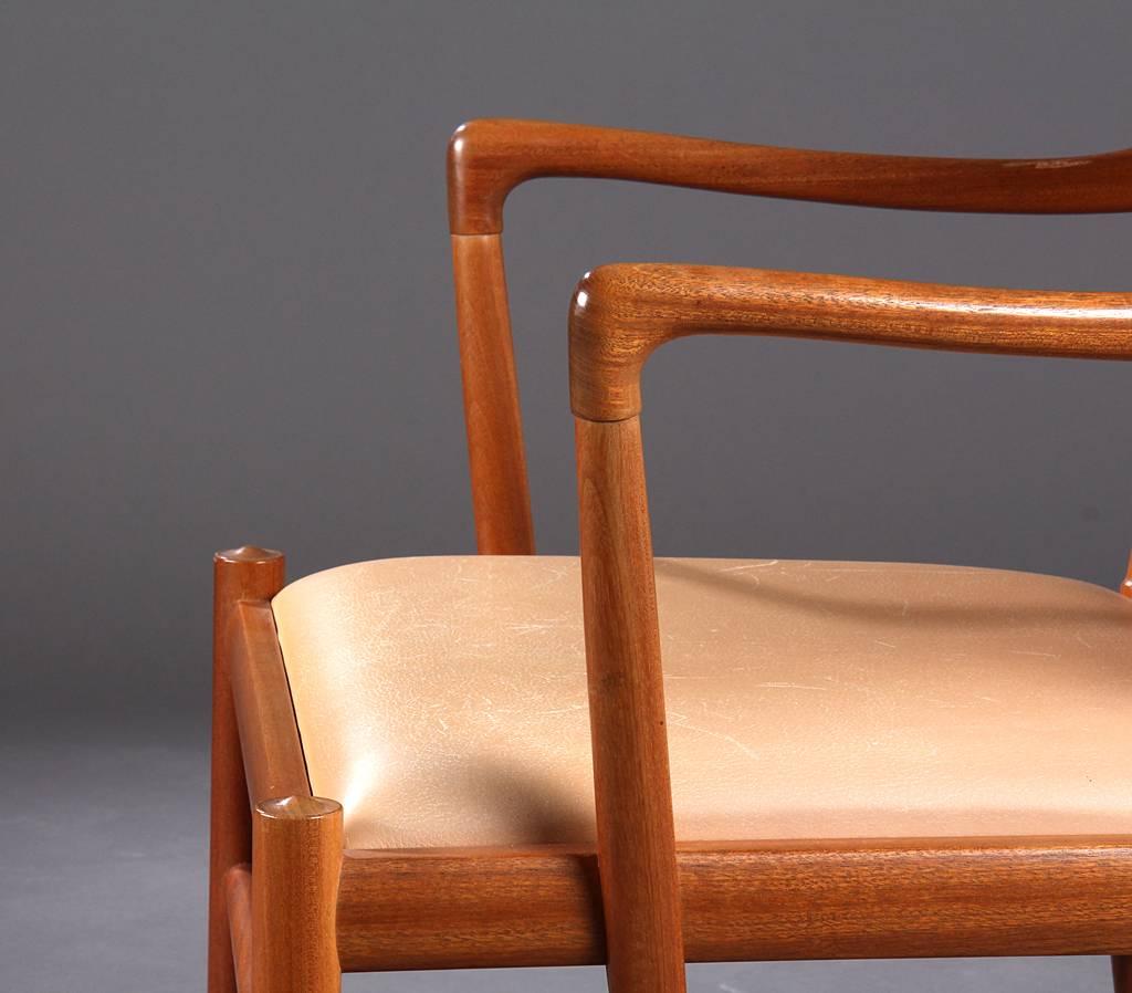 Ole Wascher leather and cane, mahogany arm chair In Good Condition In New York, NY