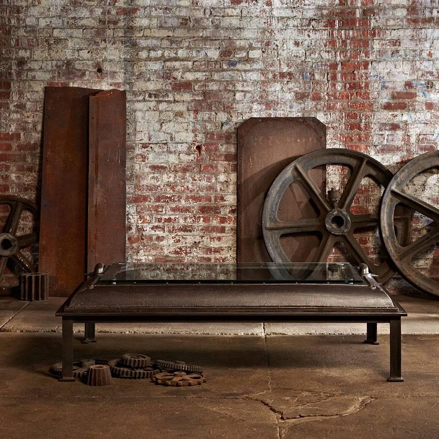 Cast iron, boiler room door from the Esquire building in New York, made into a coffee table.