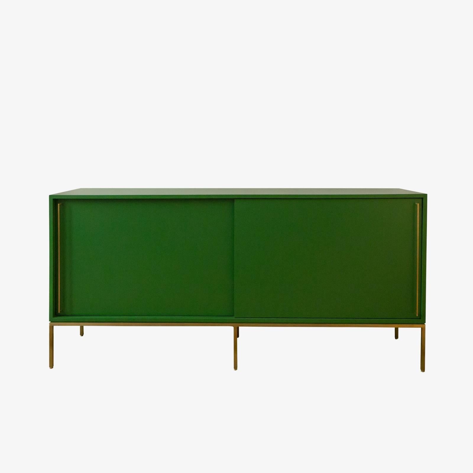 Mid-Century inspired credenza series from reGeneration. Lacquered case available in a range of colors on brass, satin stainless steel or powder coated base. re: 379.