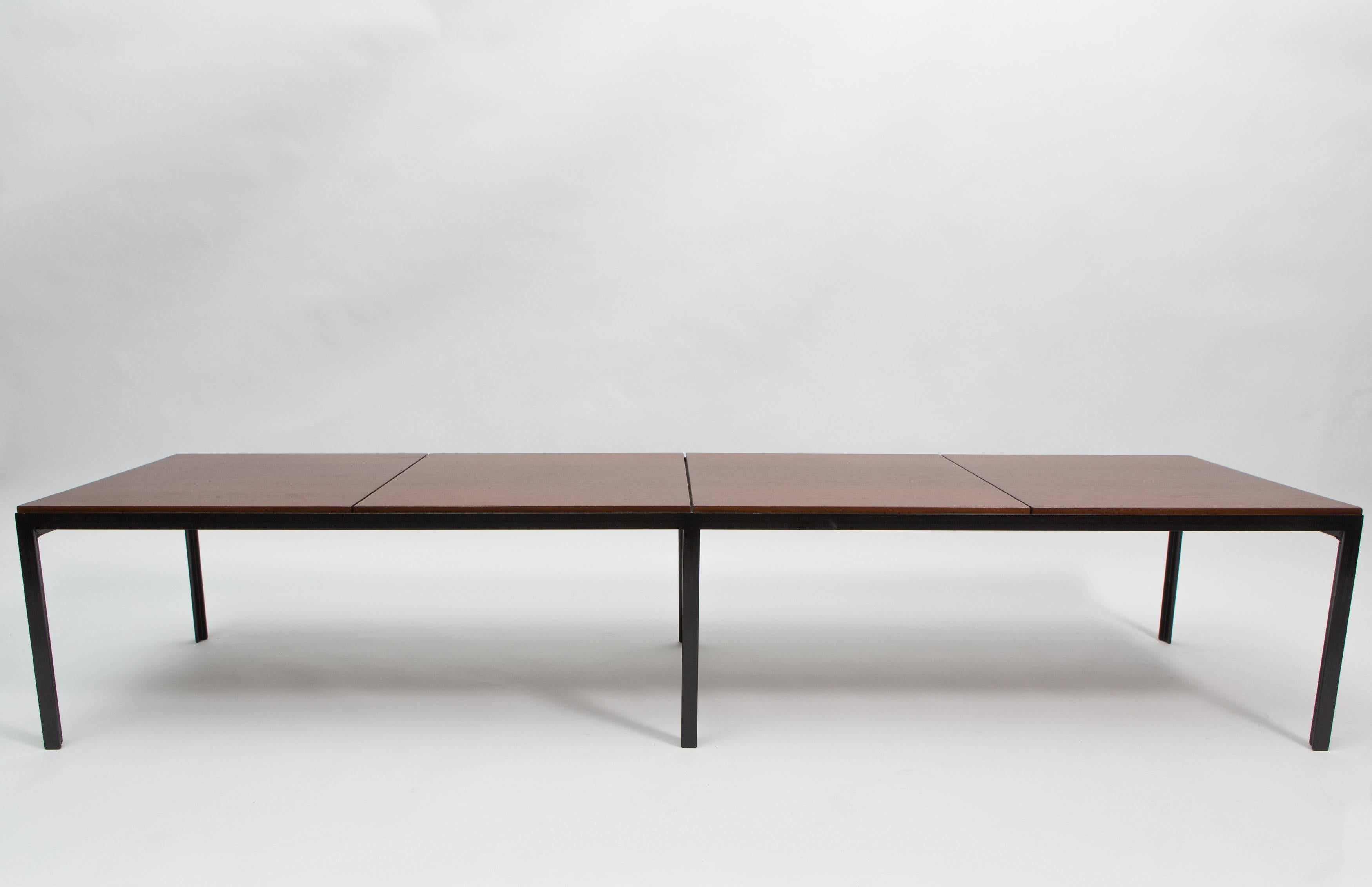 Classic Florence Knoll walnut and angle steel coffee table or bench, 1950s.