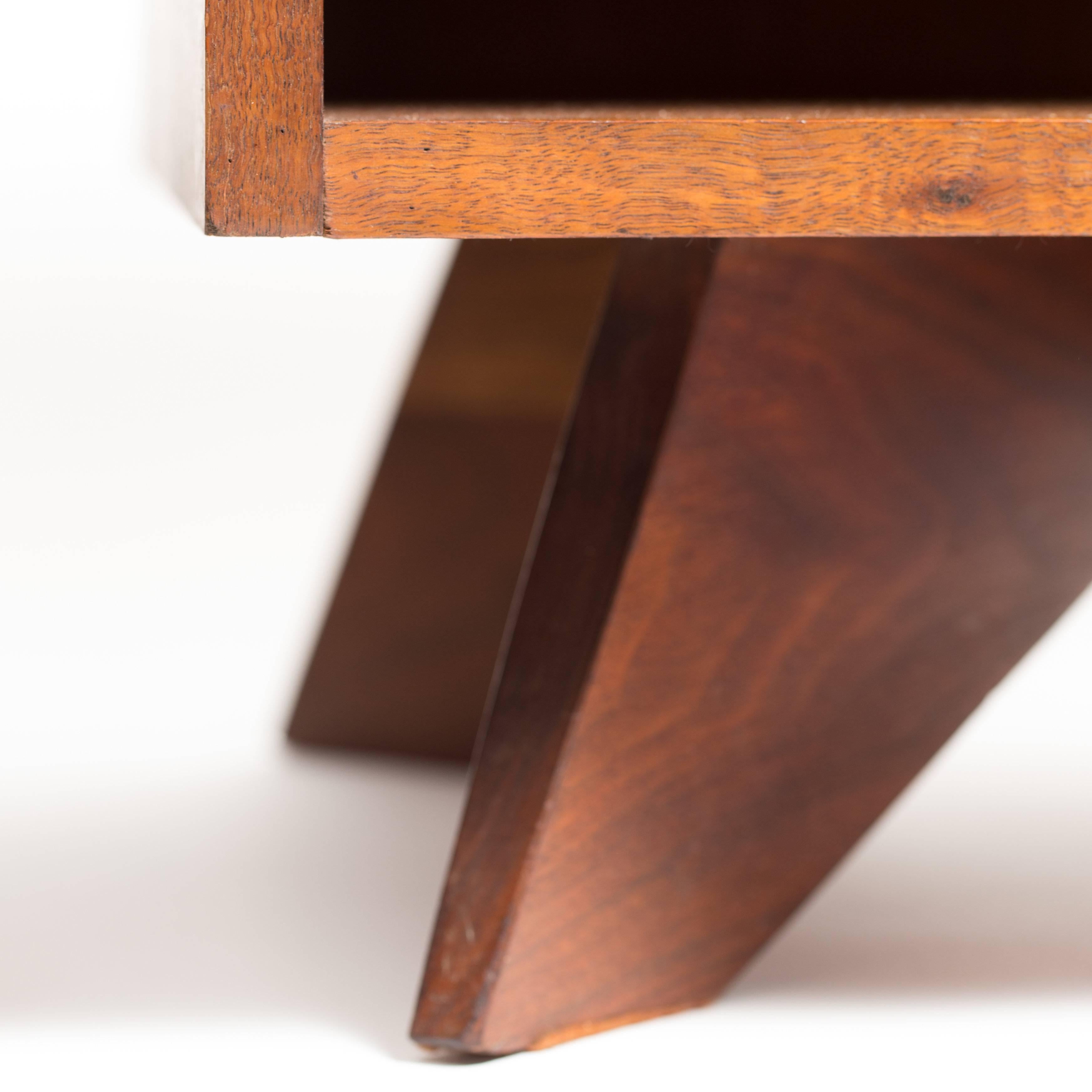 Pair of sculptural, George Nakashima walnut bedside tables, mfg. Widdicomb.