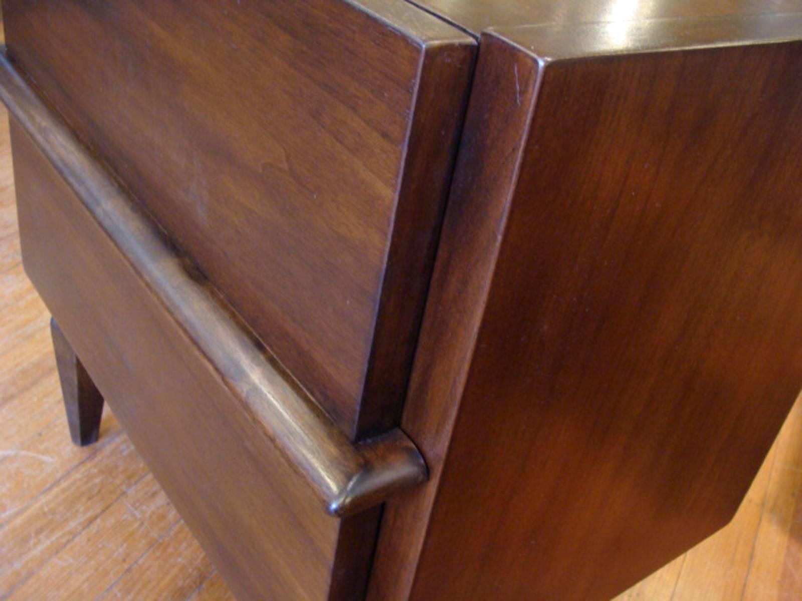 Pair of nightstands or end tables in walnut. Finish restored.

See separate listing for matching five-drawer dresser.