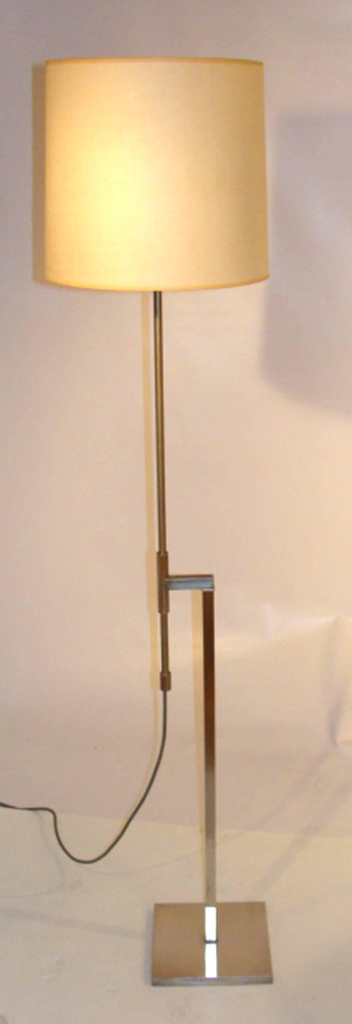 Outstanding adjustable height floor lamp by Laurel Lamp Co. having original shade, harp and finial. Superb original condition.