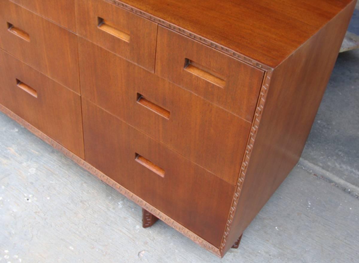 FLW 11-drawer cabinet or dresser, collaboration with Heritage Henredon, 1955.

Mahogany case with distinctive 