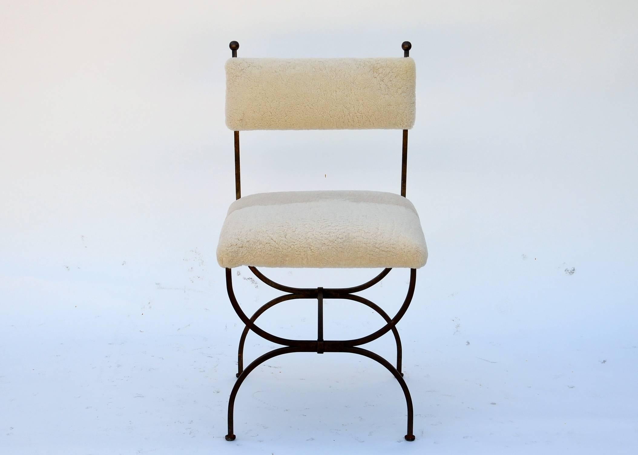 Exceptional Wrought iron and sheepskin side chair by Gilbert Poillerat.

Provenance: Parisian apartment of Gilbert Poillerat.
