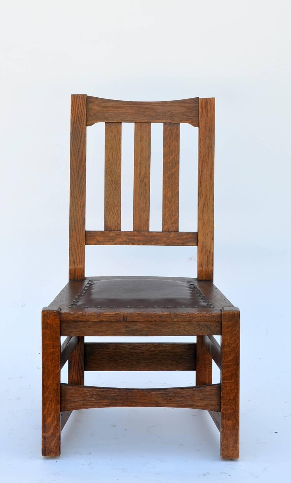 Petite Mission style Arts & Crafts low chair by Stickley Brothers.