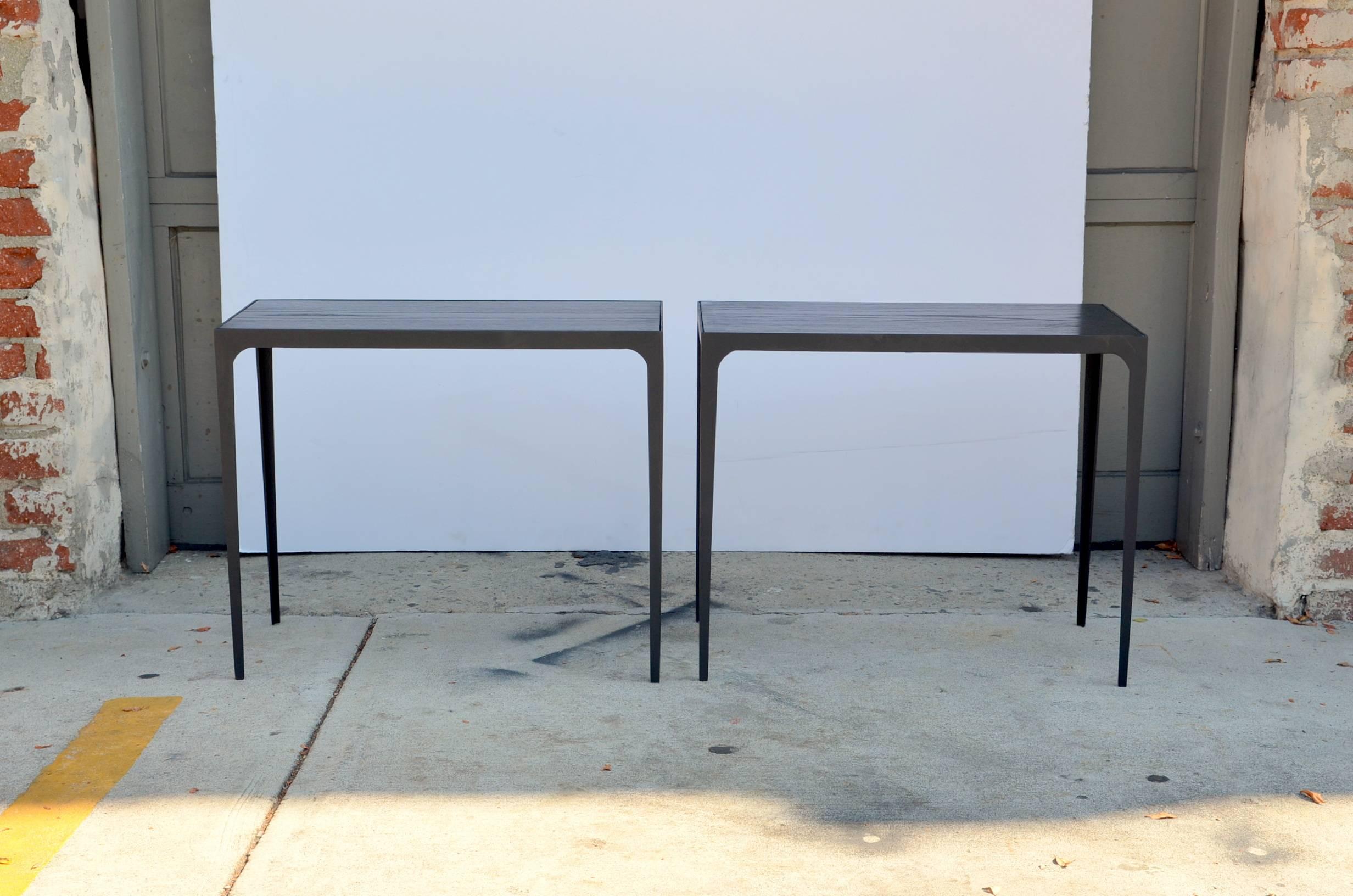 Pair of 'Esquisse' ebonized sandblasted oak side tables in the style of Jean-Michel Frank. Chic design and finish.