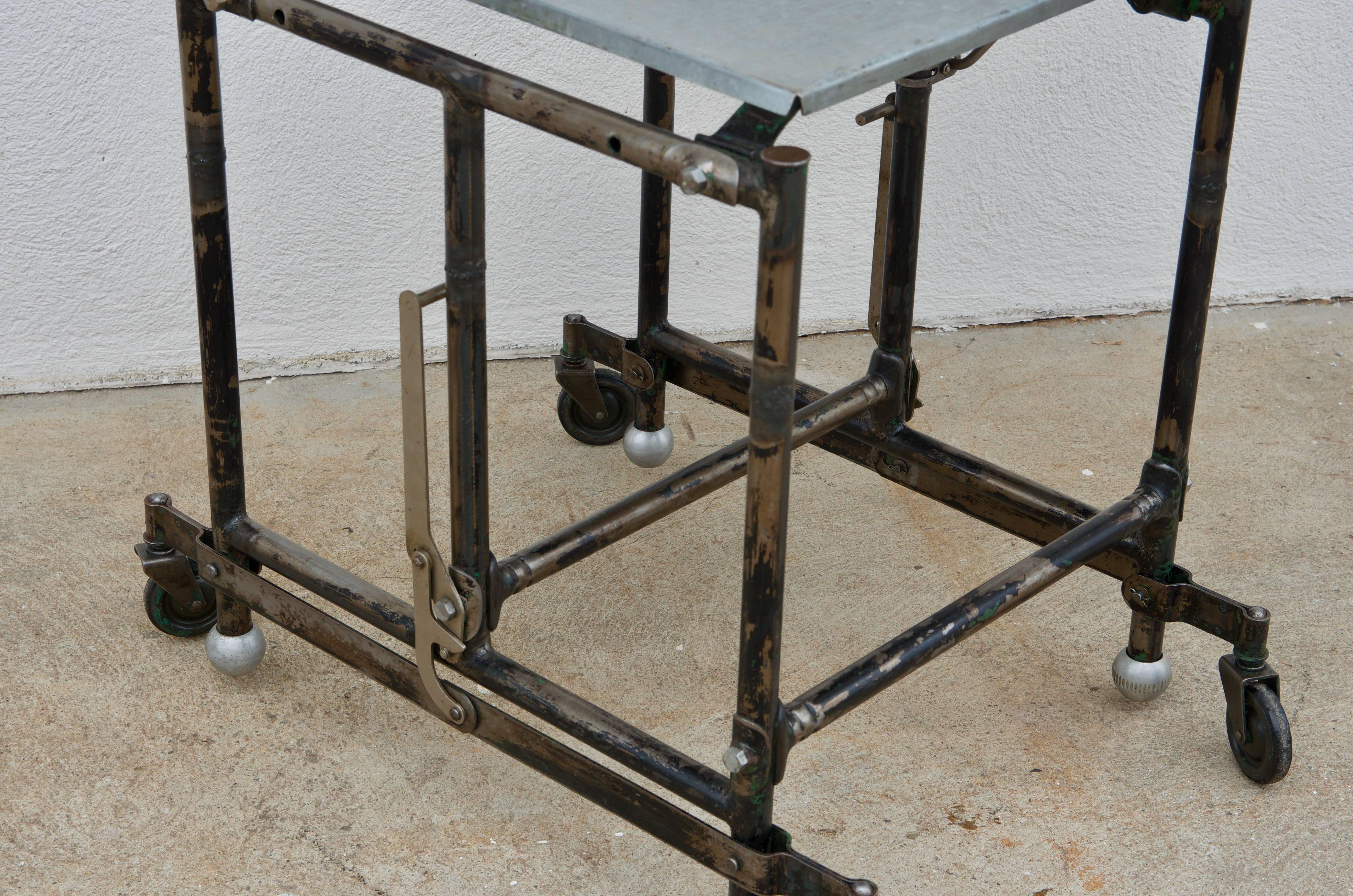 Patinated Steel and Zinc Industrial Rolling Side Table or Nightstand In Good Condition In Los Angeles, CA