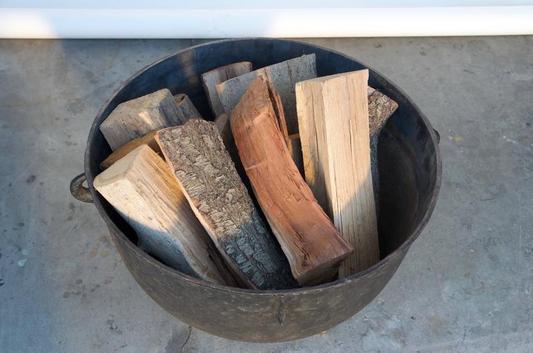 Large Patinated Iron Cauldron Wood Holder at 1stDibs