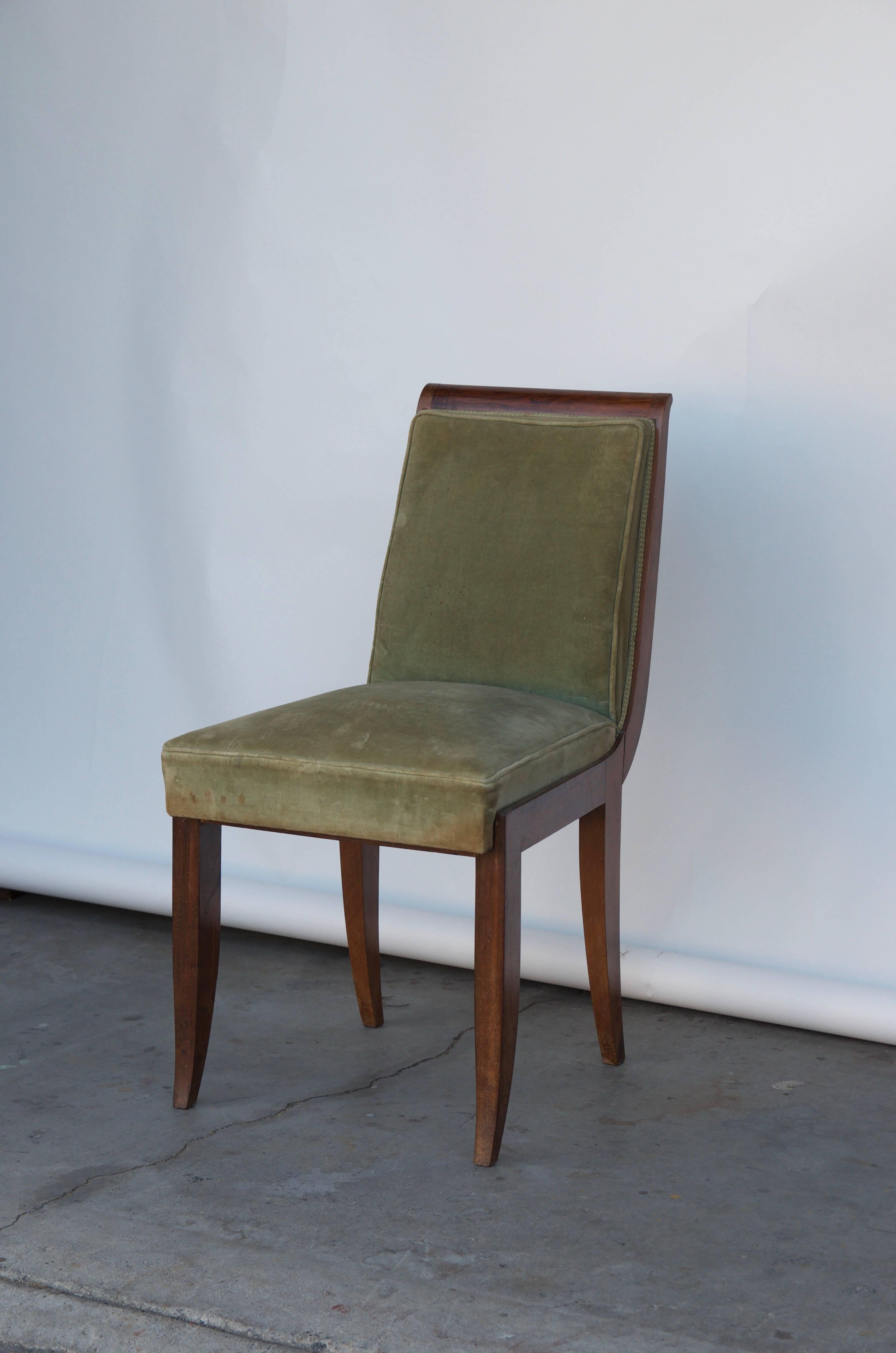 Elegant Art Deco mahogany side chair in the style of Jean Pascaud.