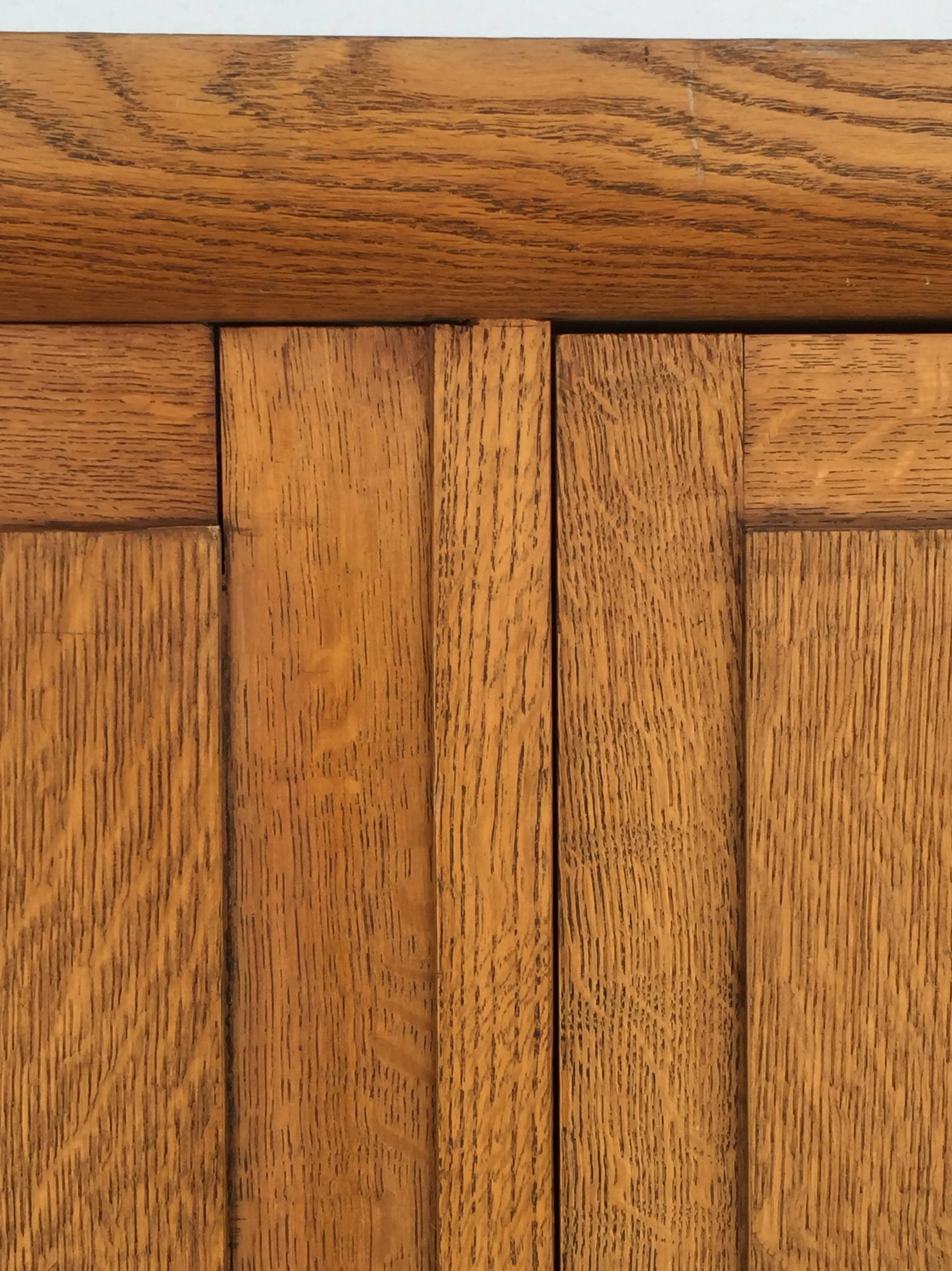 Carved Incredible Polished Oak Low Armoire by Jacques Adnet