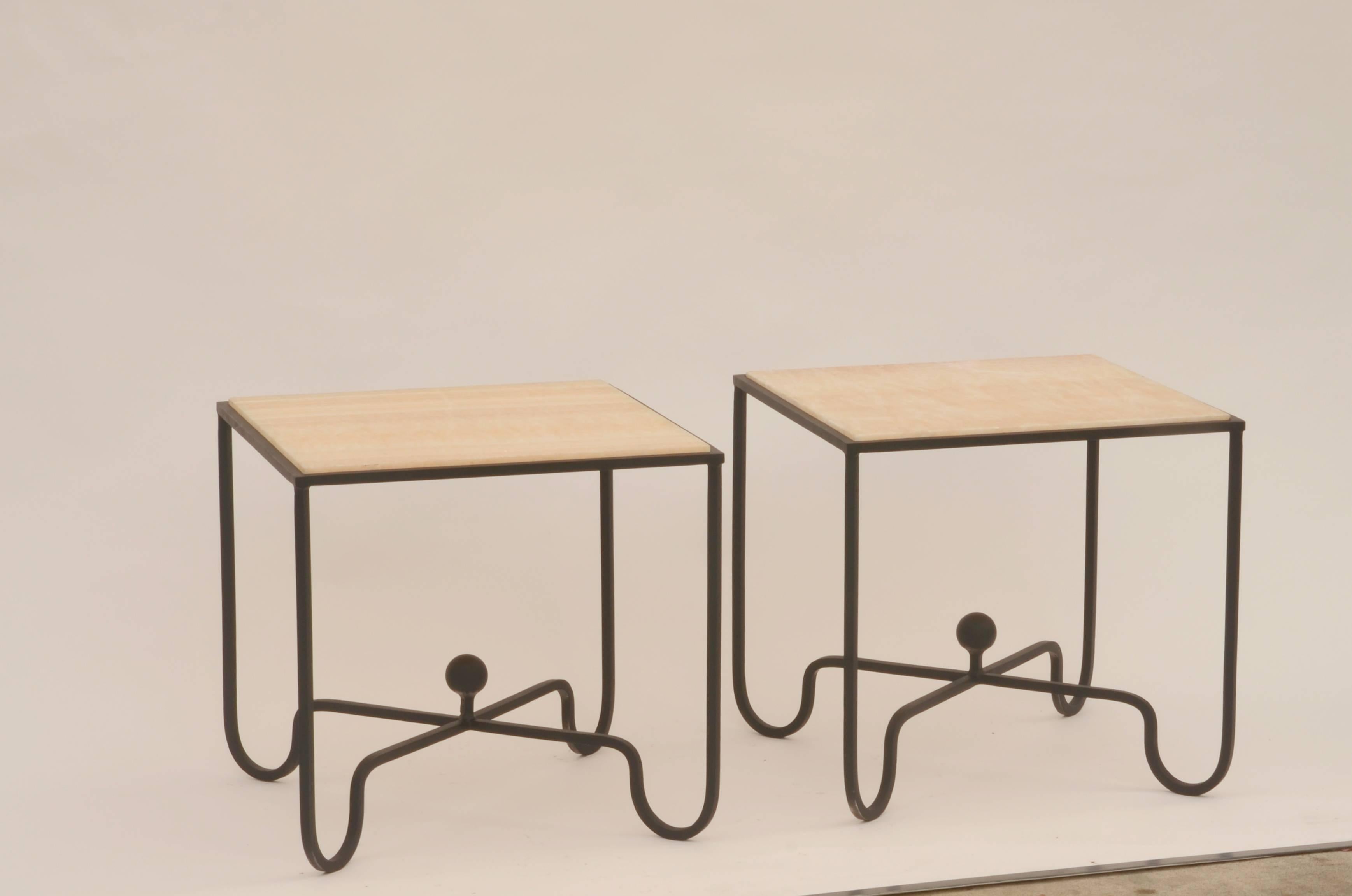 Pair of 'Entretoise' wrought iron and onyx side tables by Design Frères. Great as end tables or as a two-part coffee table. In the style of Mathieu Matégot.